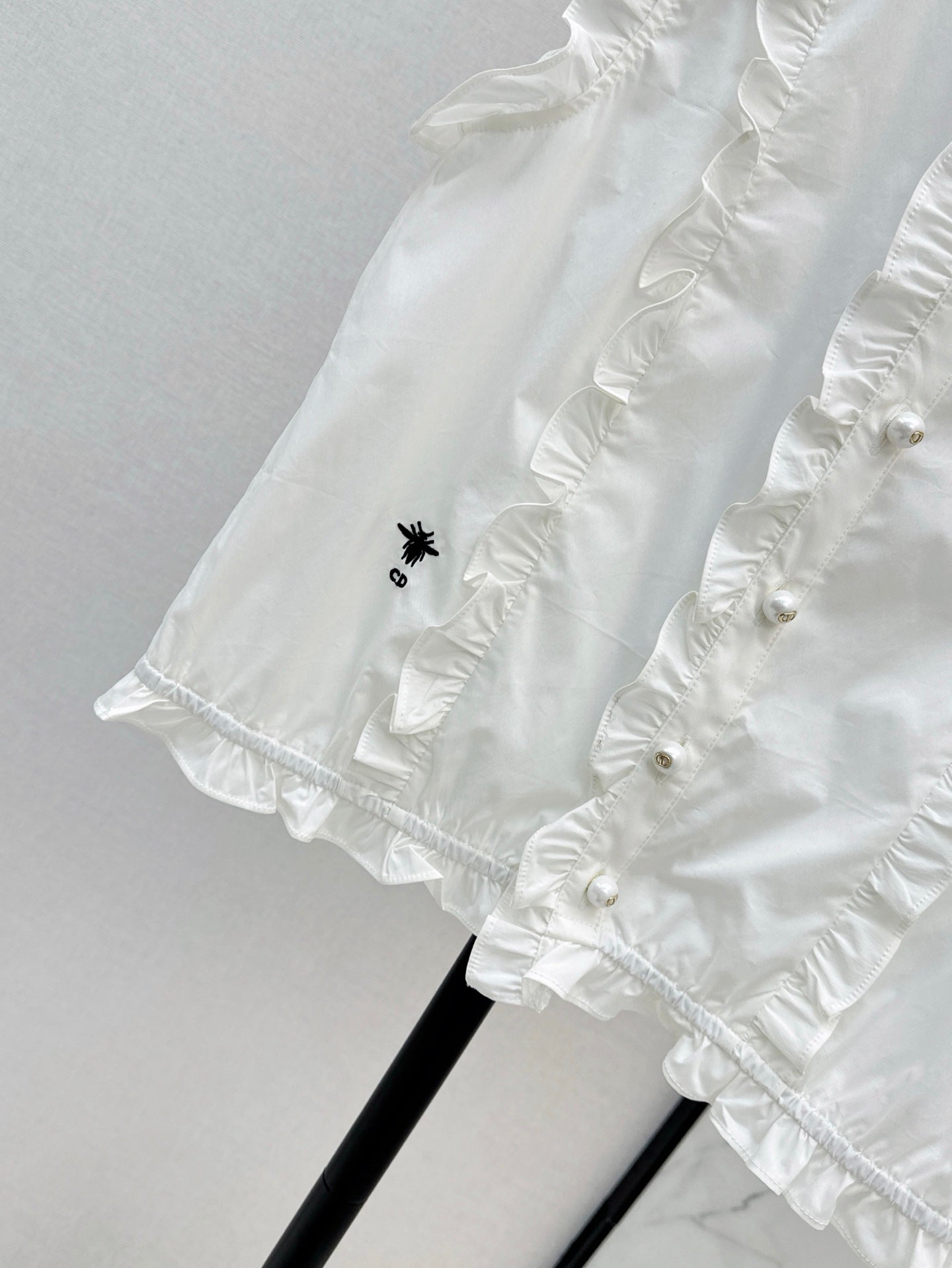 D*r 25ss Sleeveless shirt with ruffle trim