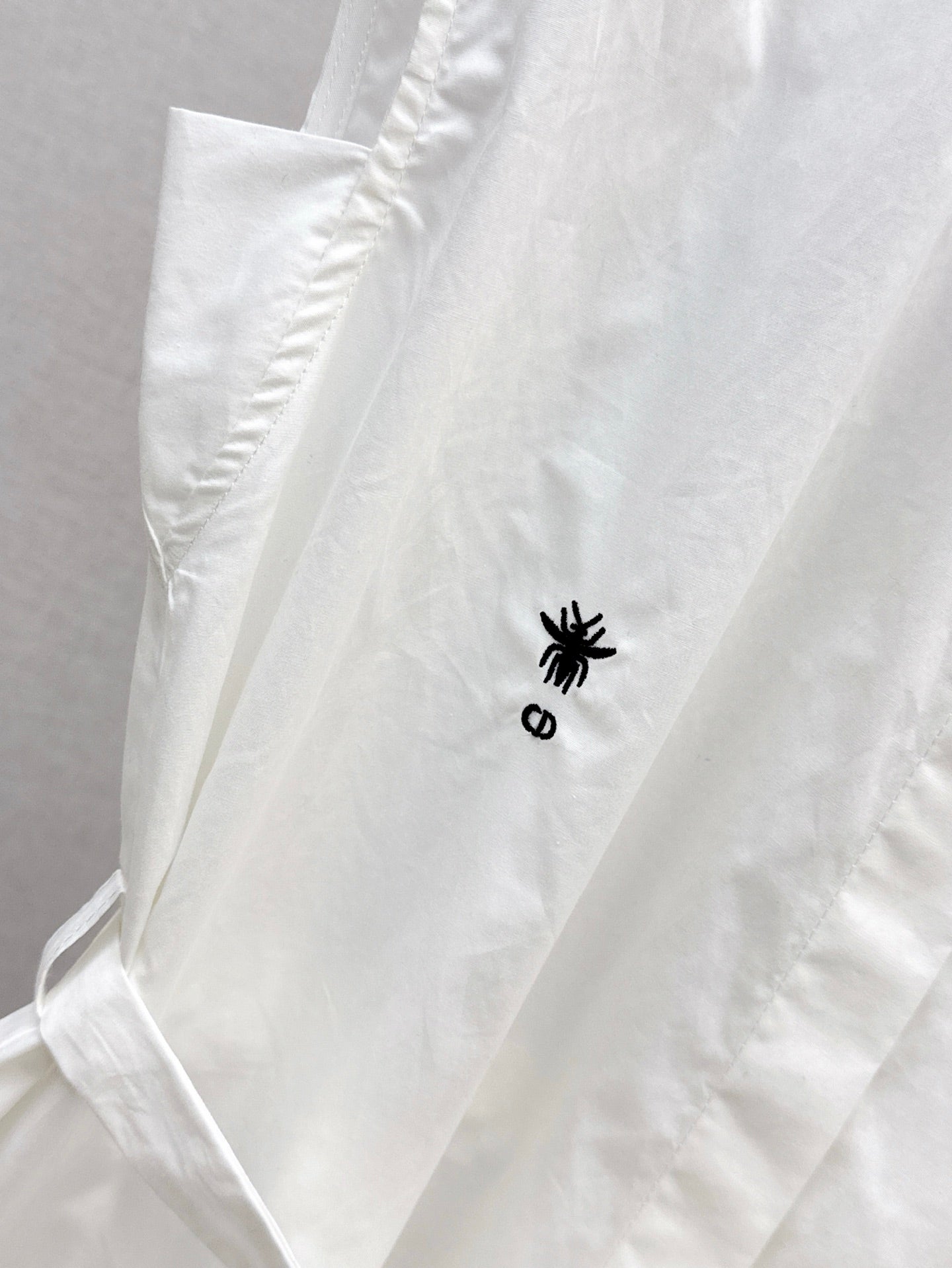 D*r 25ss sleeveless tied poplin blouse