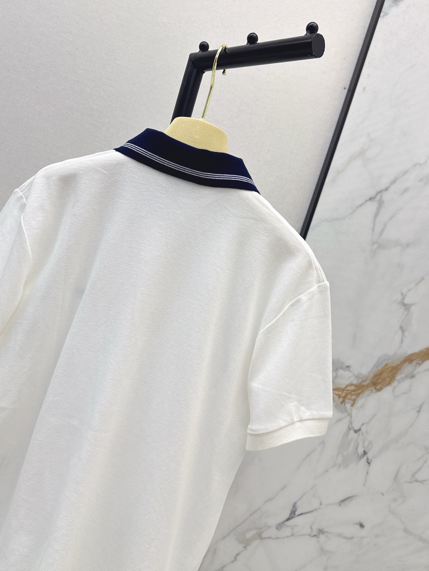 M*u 25ss logo embroidered polo shirt