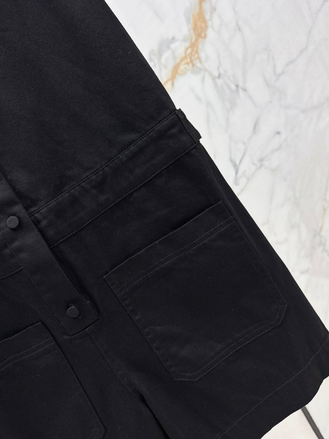 Gu* denim jumpsuit with horsebit