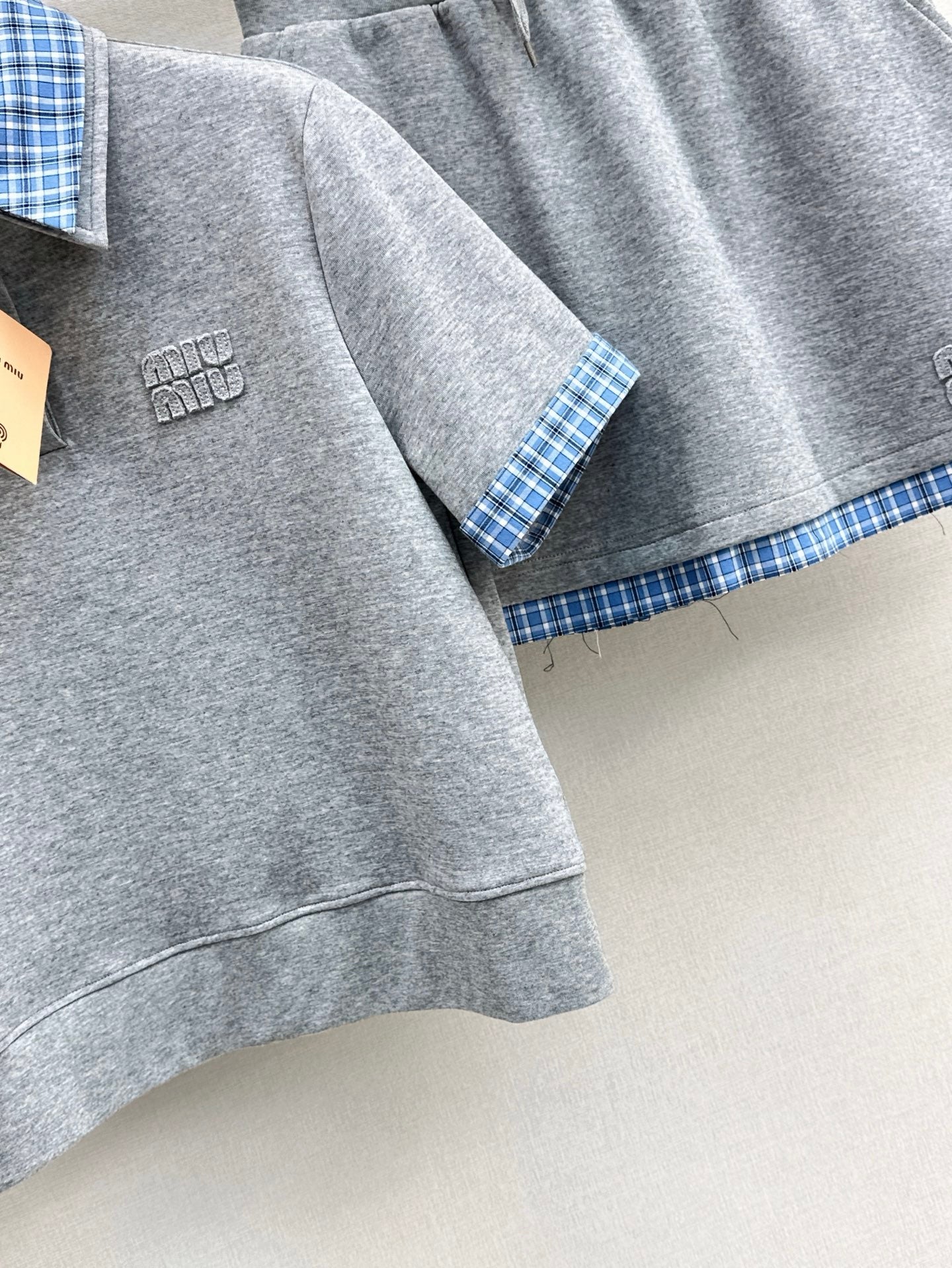 M*u 25ss Plaid lapel top + mini skirt suit