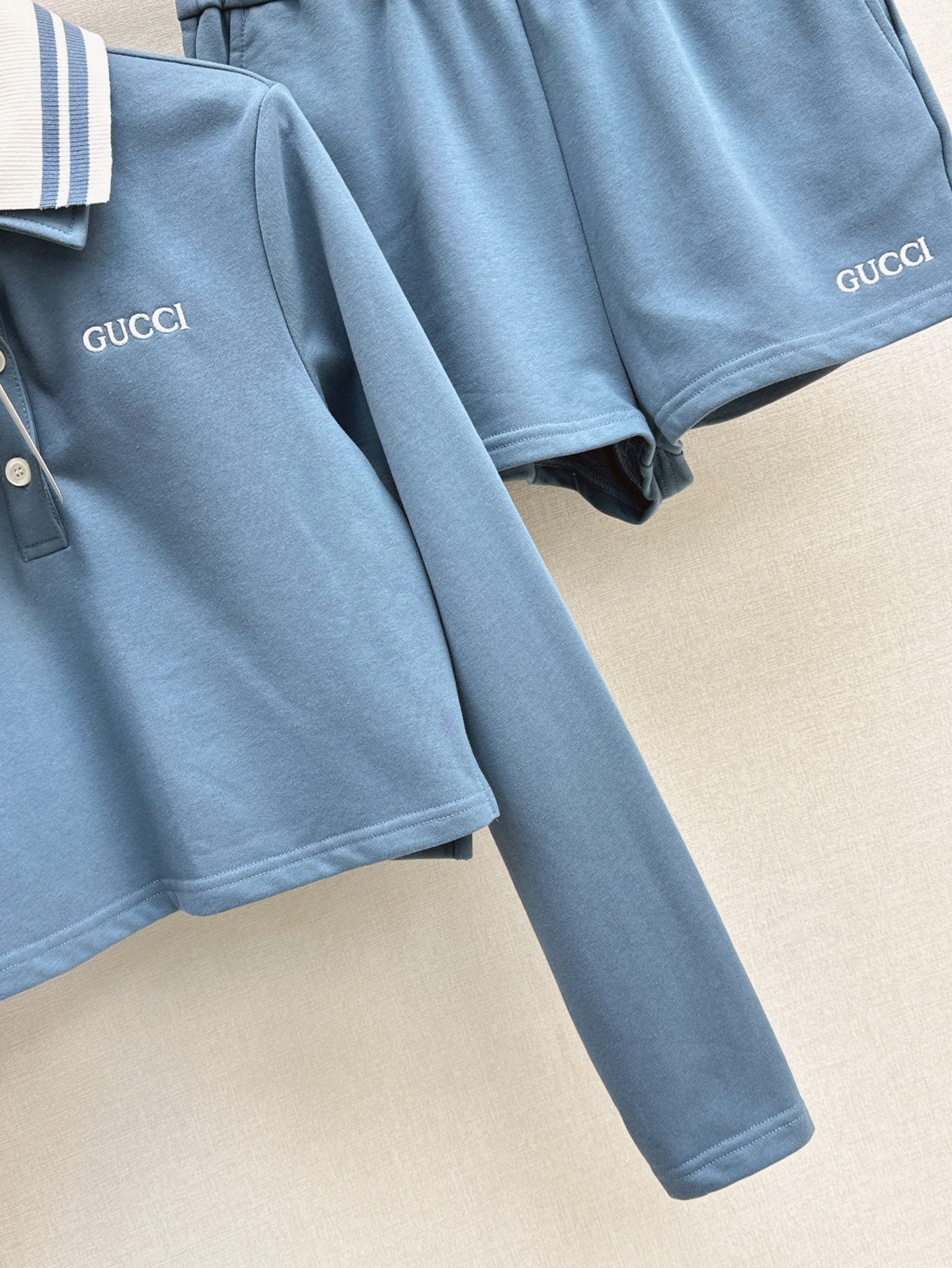 Gu* 25ss Polo collar crop trucksuit set