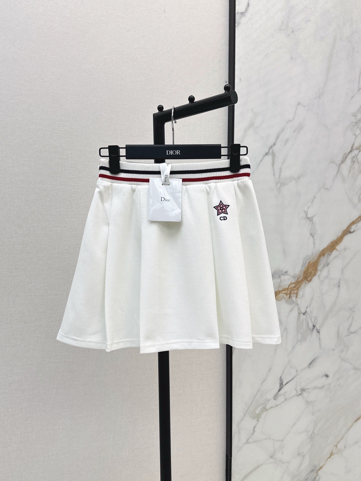 D*r 25ss Web waist pleated mini skirt