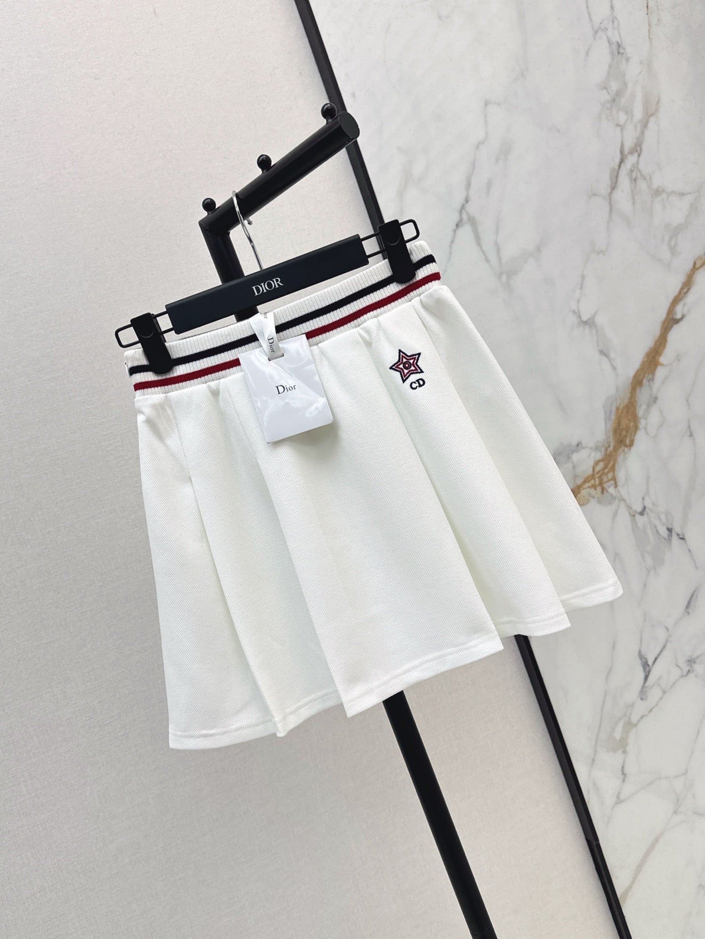 D*r 25ss Web waist pleated mini skirt
