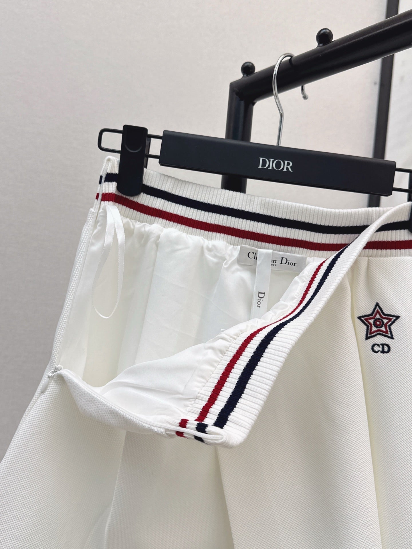 D*r 25ss Web waist pleated mini skirt