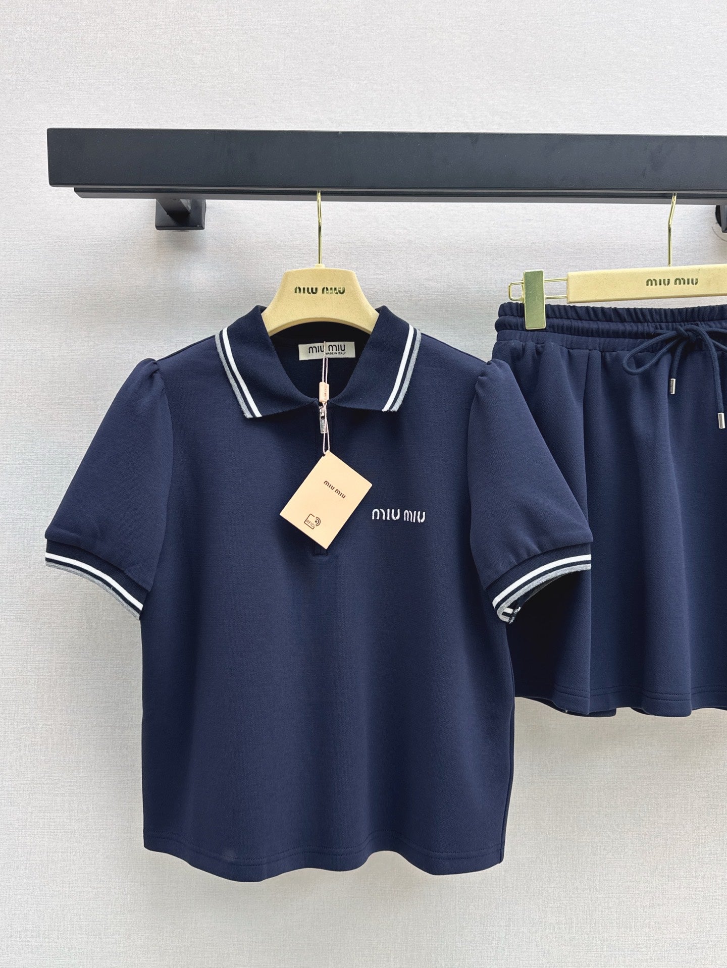 M*u 25ss Polo collar top + mini skirt set