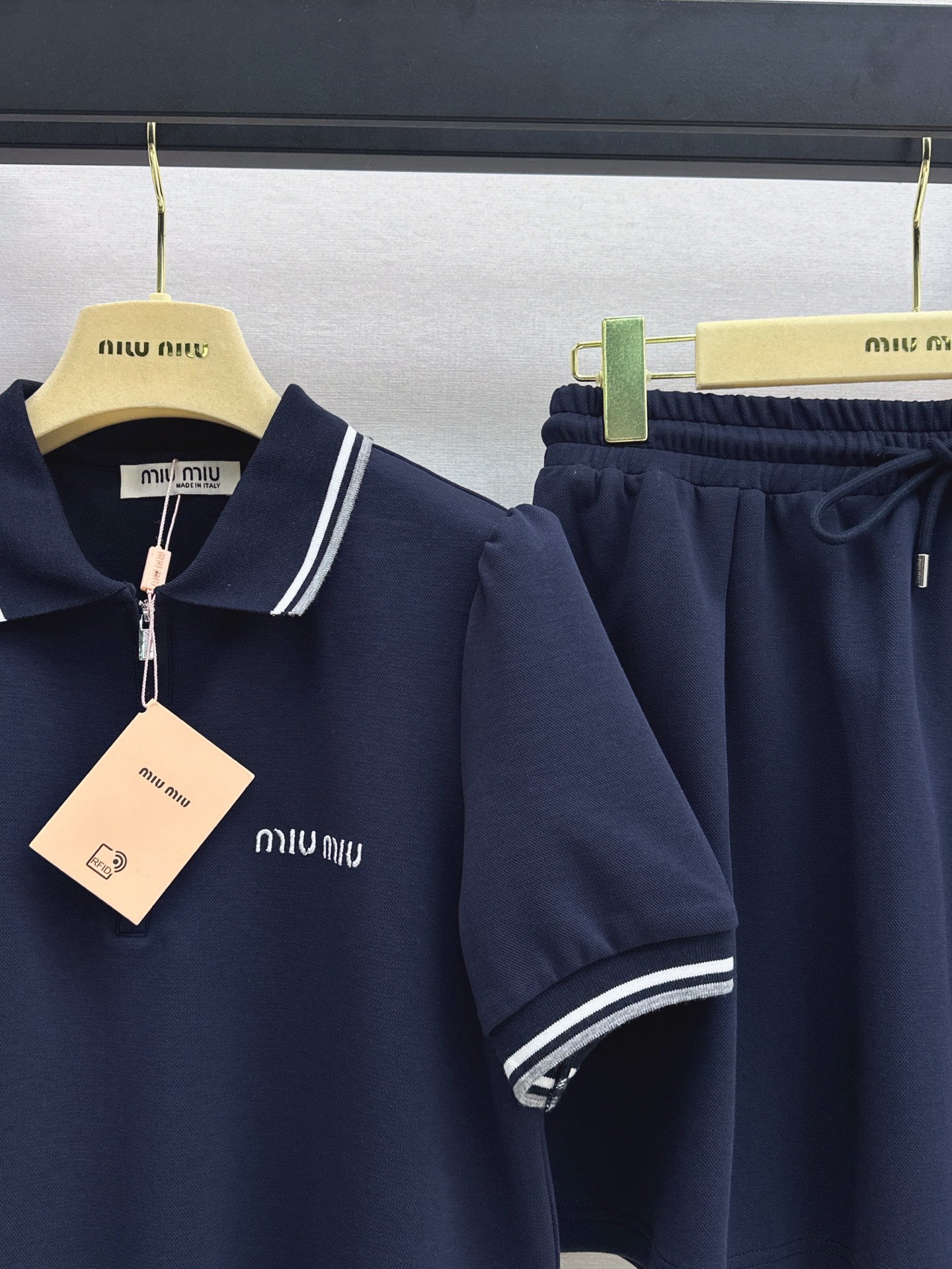 M*u 25ss Polo collar top + mini skirt set