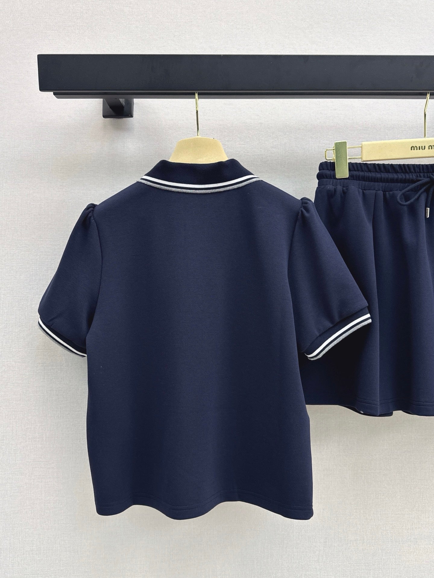 M*u 25ss Polo collar top + mini skirt set