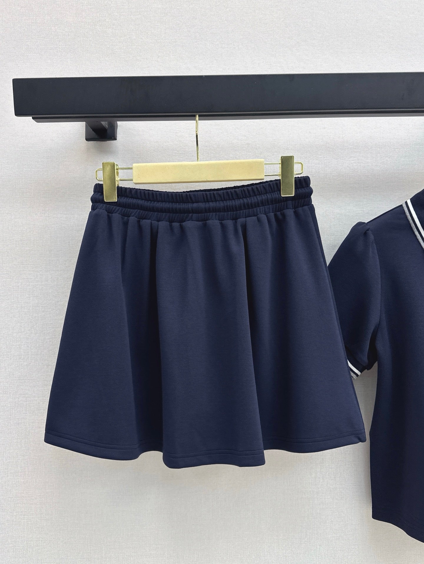 M*u 25ss Polo collar top + mini skirt set