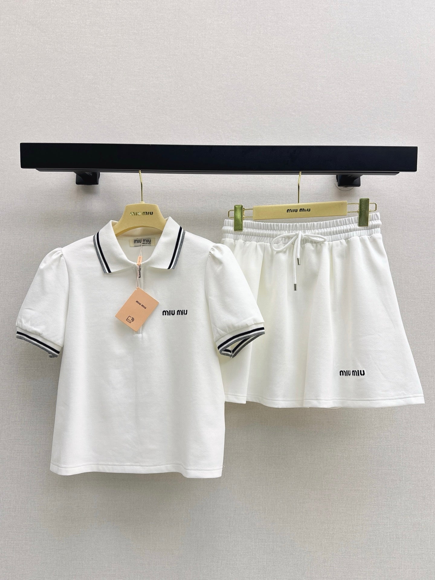 M*u 25ss Polo collar top + mini skirt set