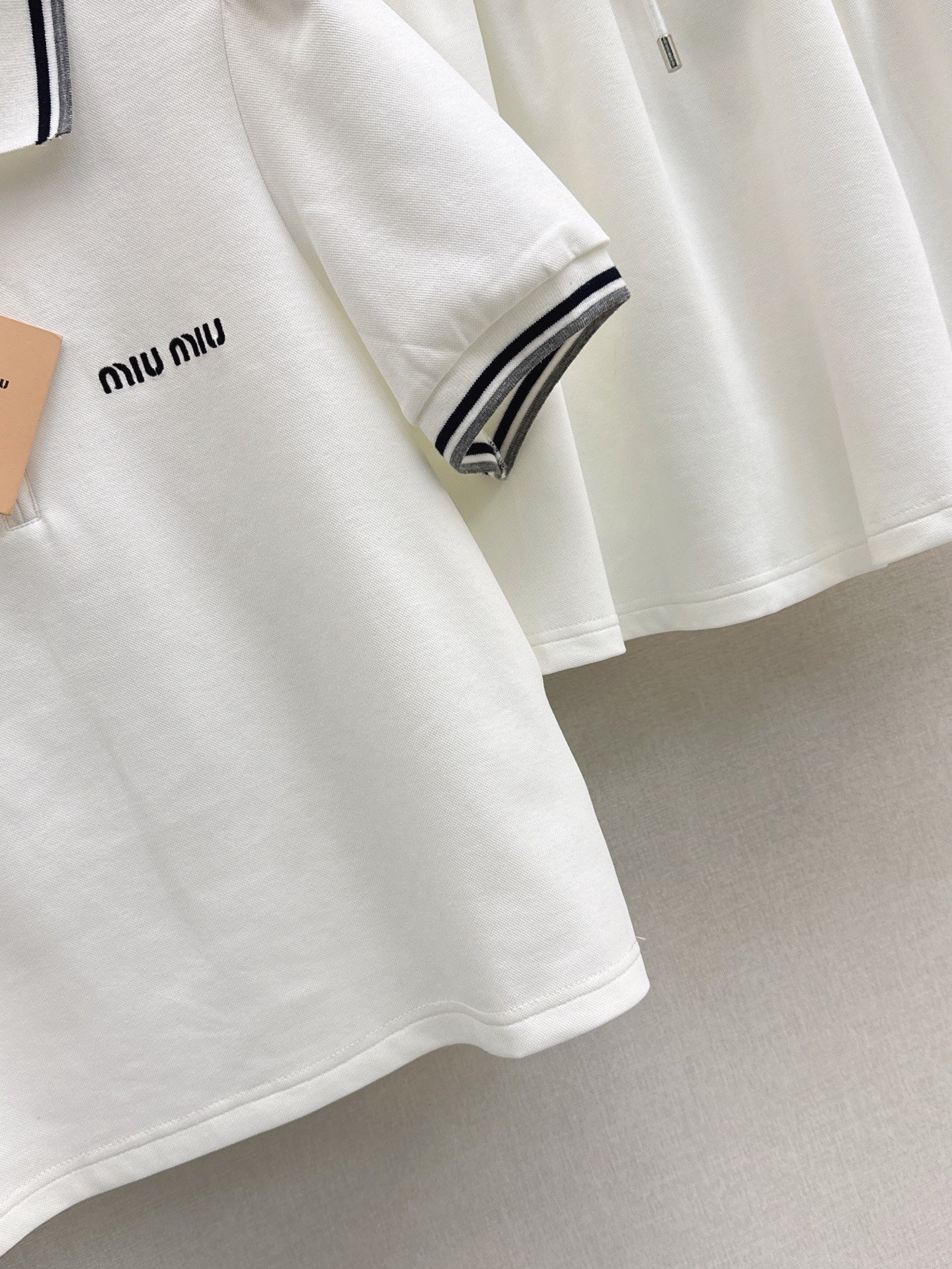 M*u 25ss Polo collar top + mini skirt set