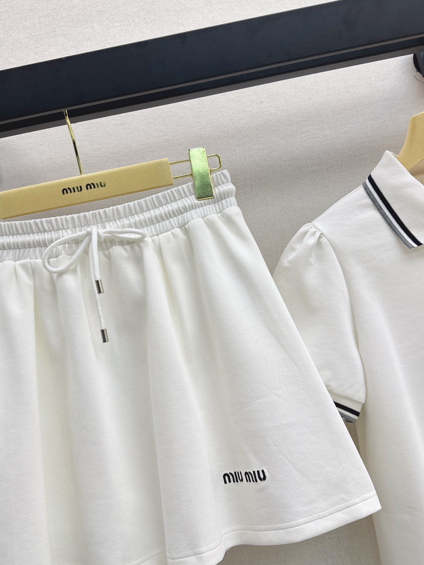 M*u 25ss Polo collar top + mini skirt set