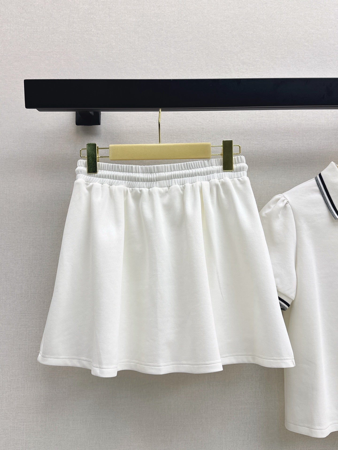 M*u 25ss Polo collar top + mini skirt set