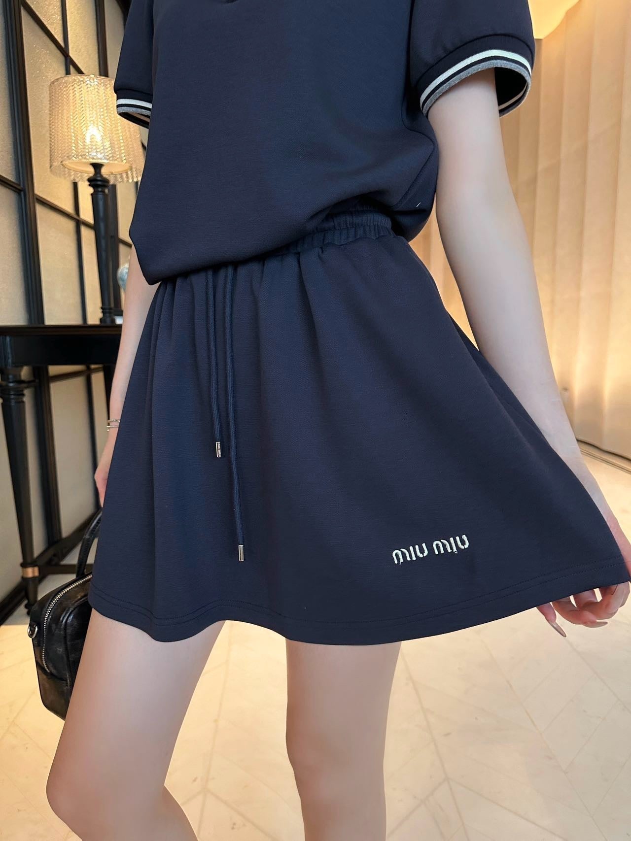 M*u 25ss Polo collar top + mini skirt set