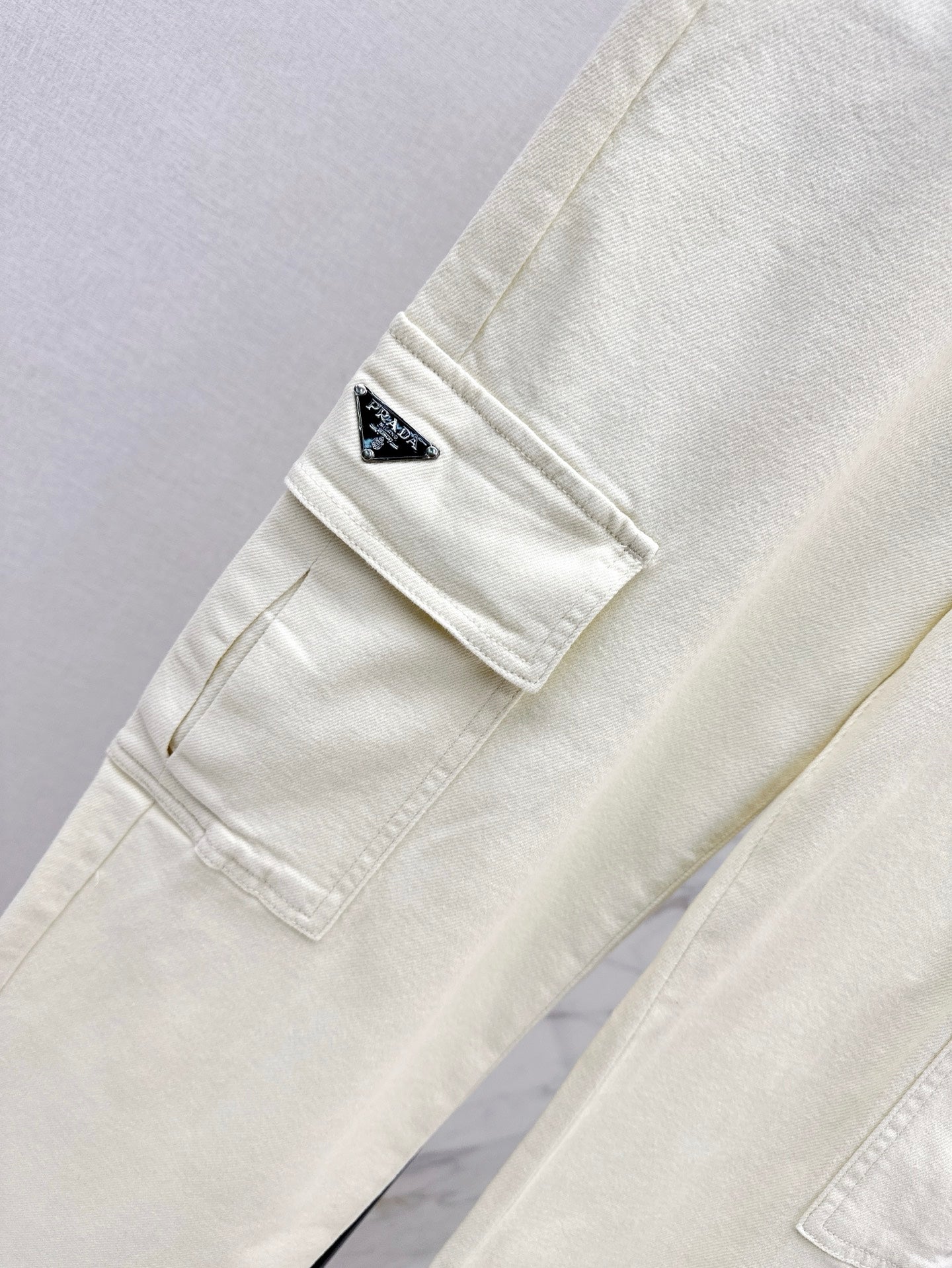 Pra* 25ss embroidered pocket jeans