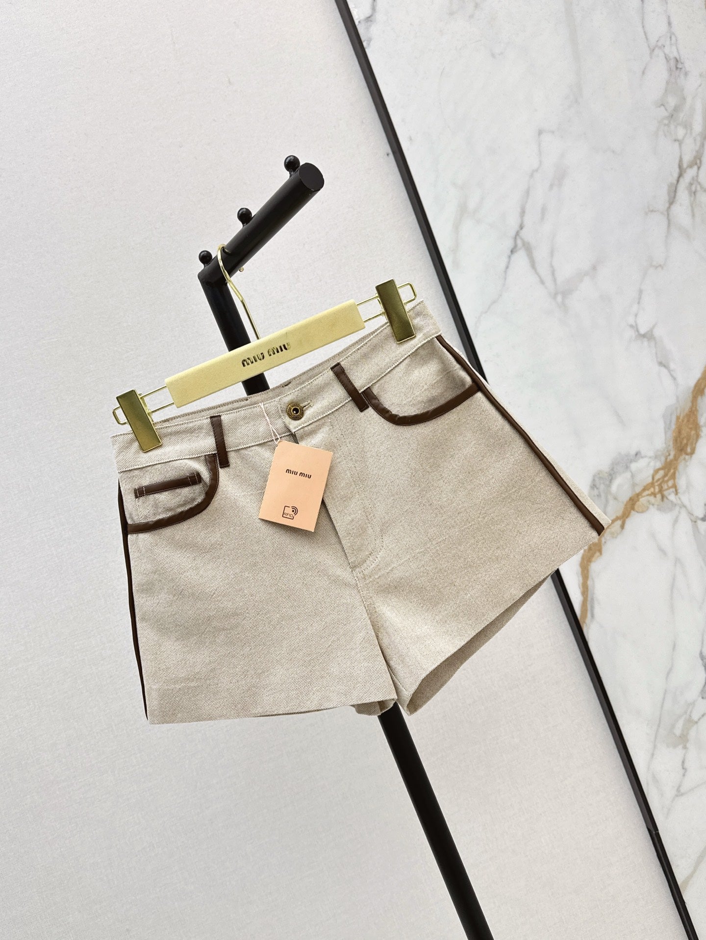 M*u 25ss Colorblock hem shorts