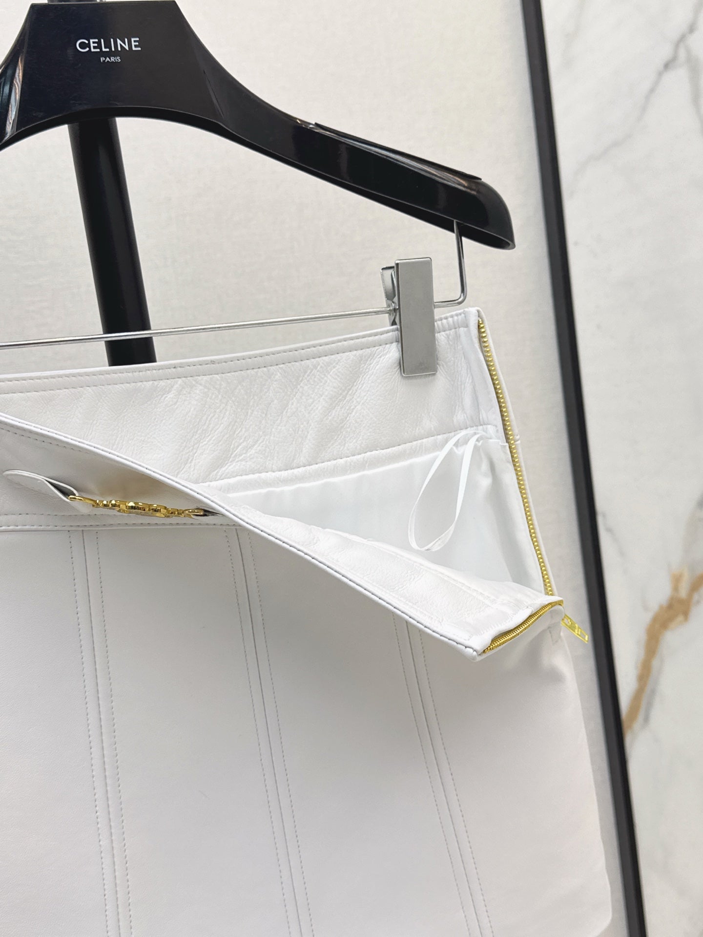 Cel* 25ss gourmette mini skirt in soft lambskin