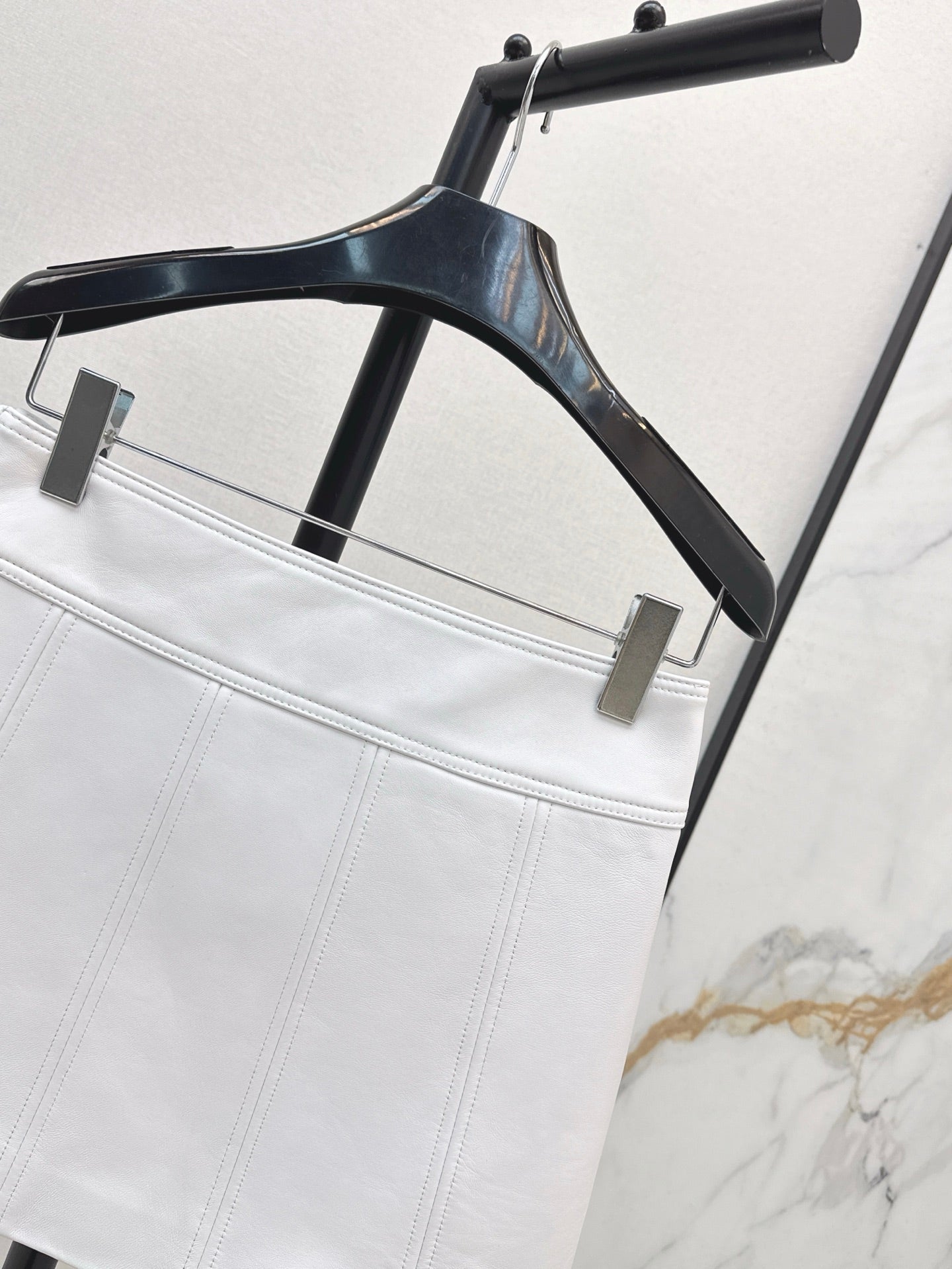 Cel* 25ss gourmette mini skirt in soft lambskin