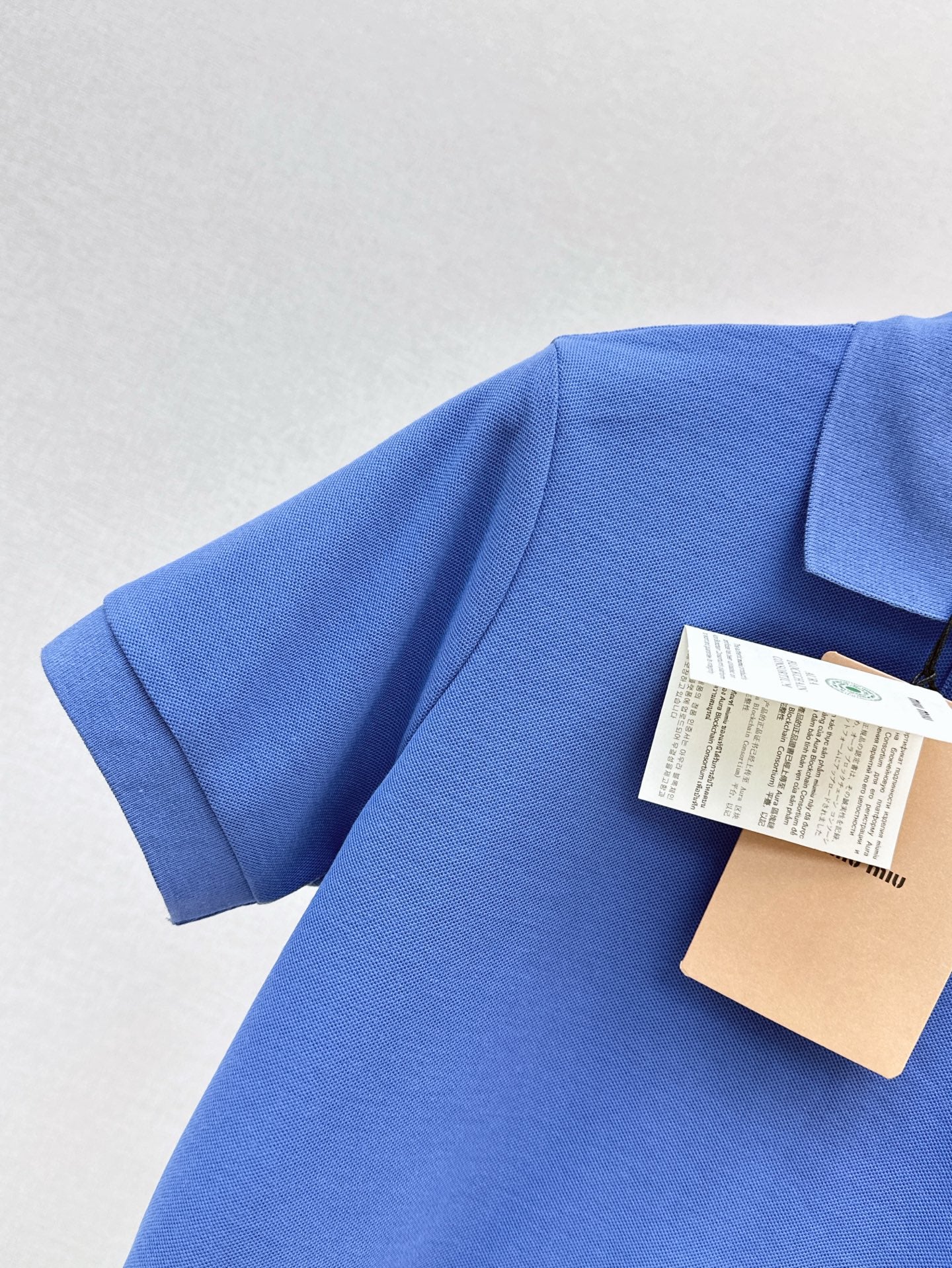 M*u 25ss embroidered crop polo shirt