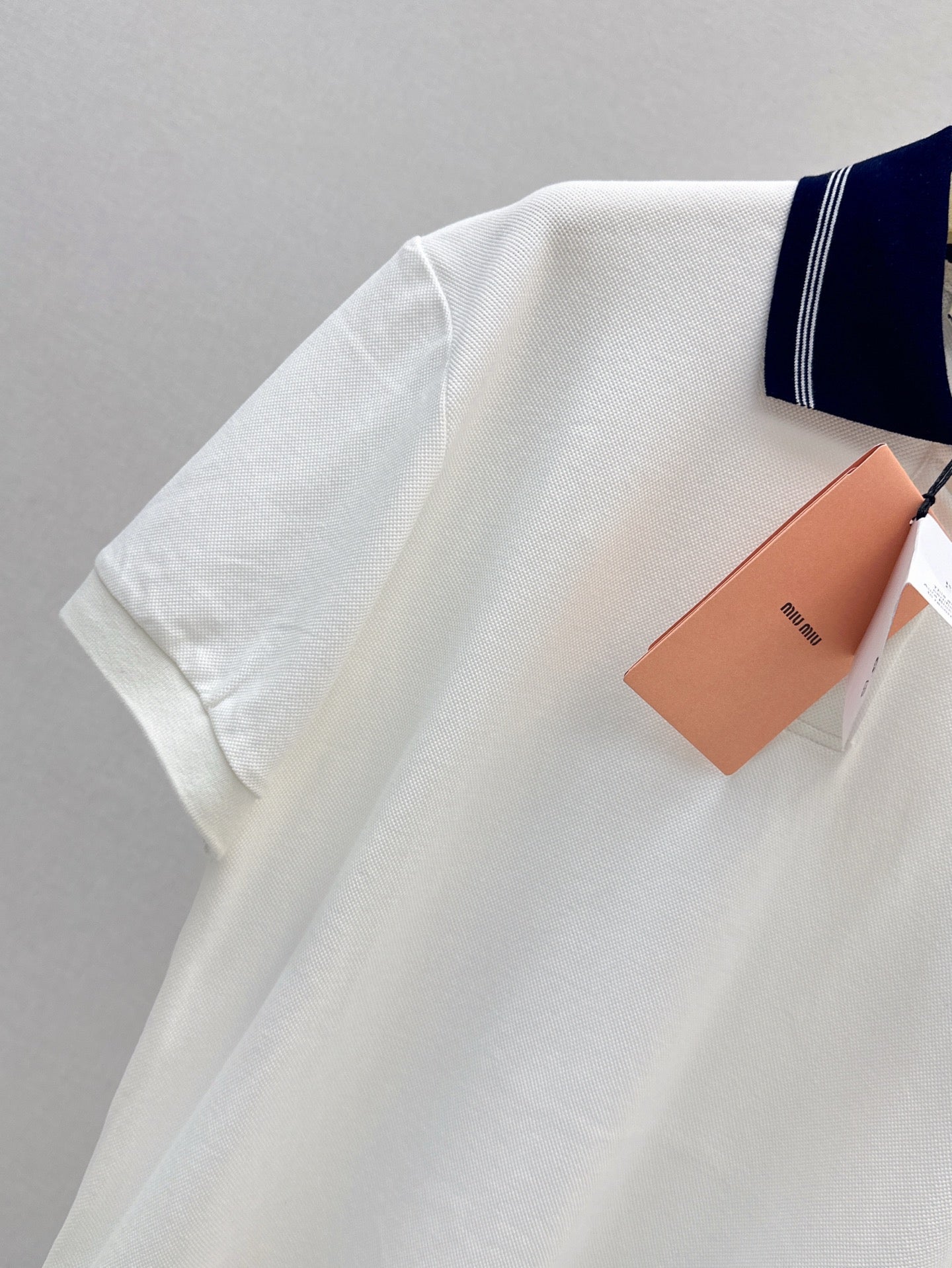 M*u 25ss logo embroidered polo shirt