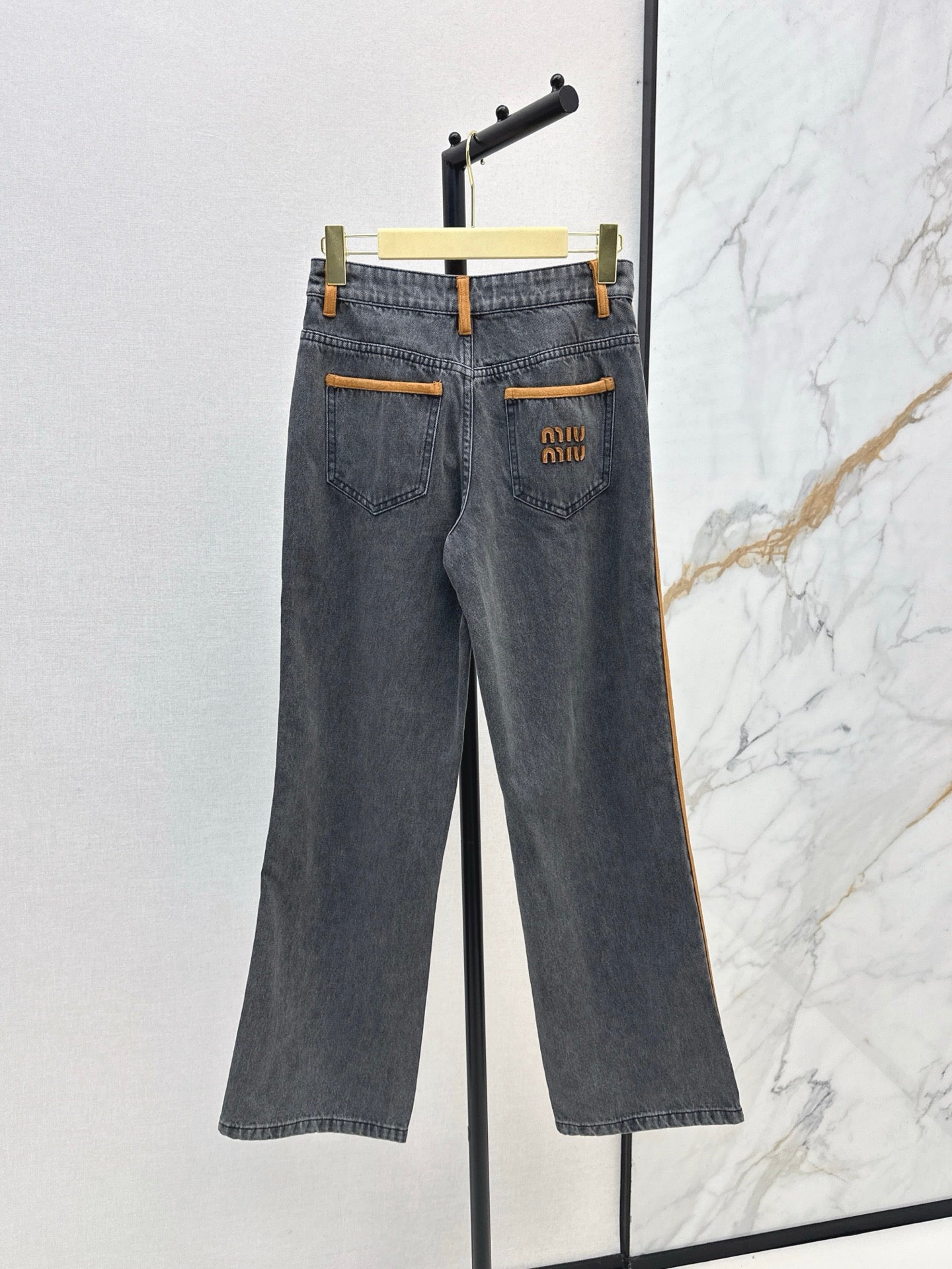 M*u 25ss denim and leather jeans