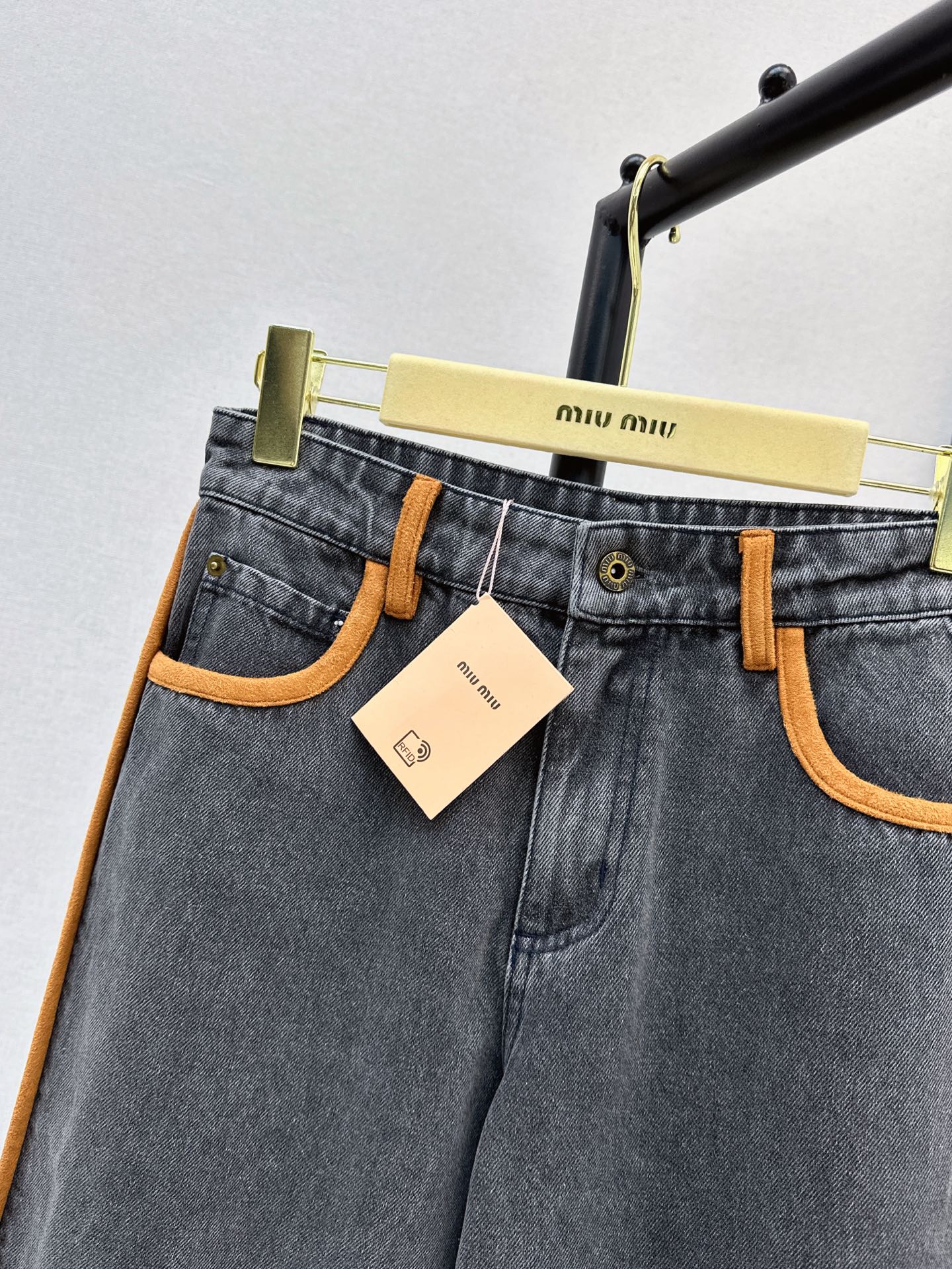 M*u 25ss denim and leather jeans