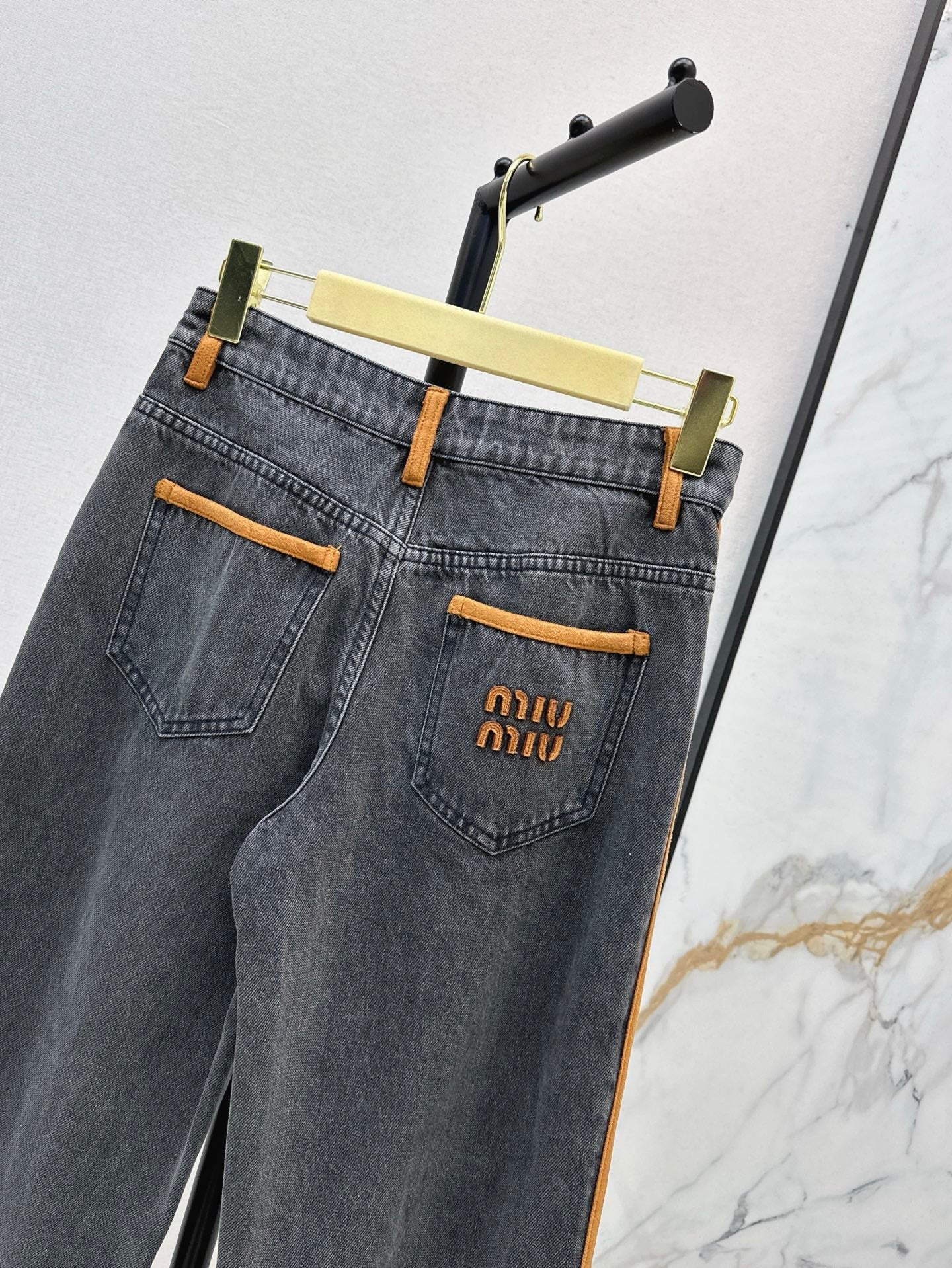M*u 25ss denim and leather jeans