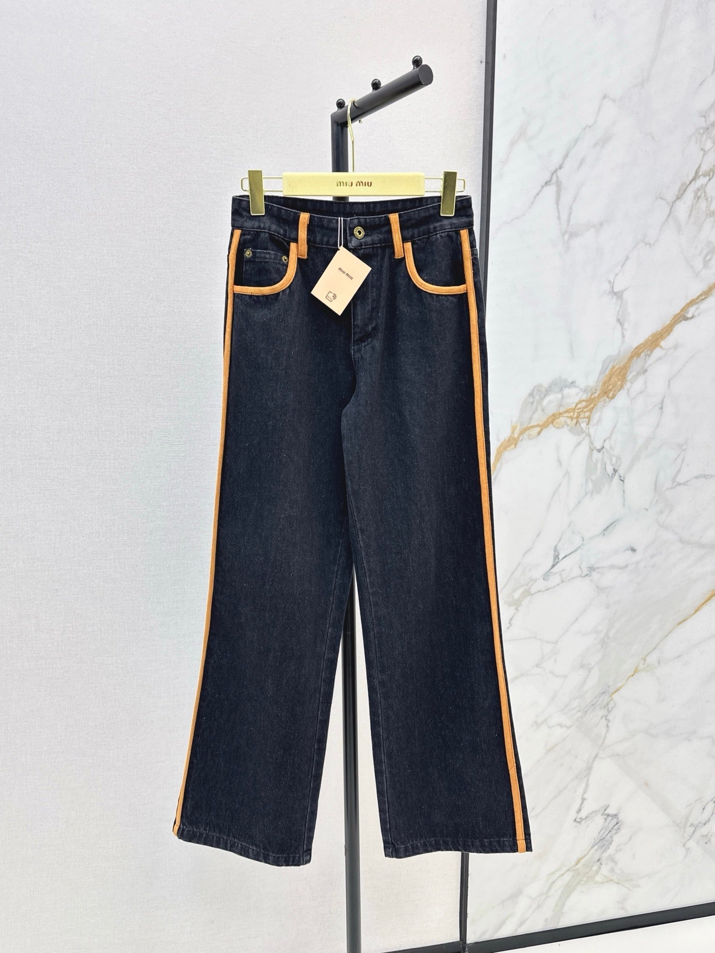 M*u 25ss denim and leather jeans