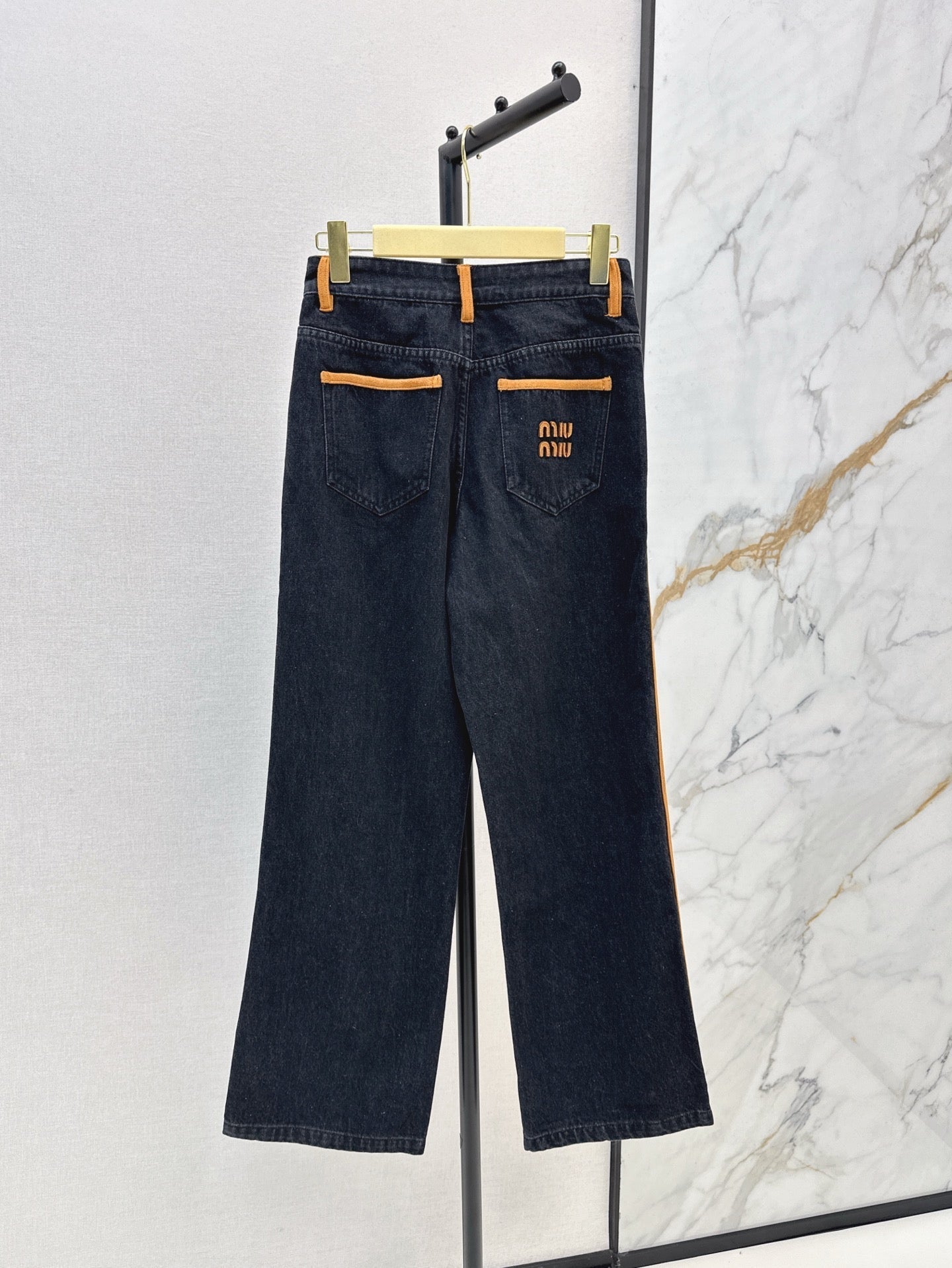 M*u 25ss denim and leather jeans