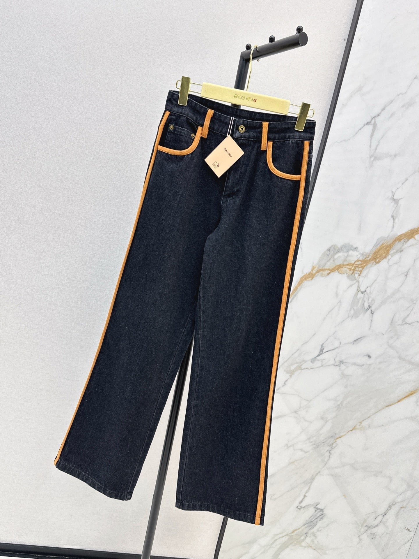 M*u 25ss denim and leather jeans