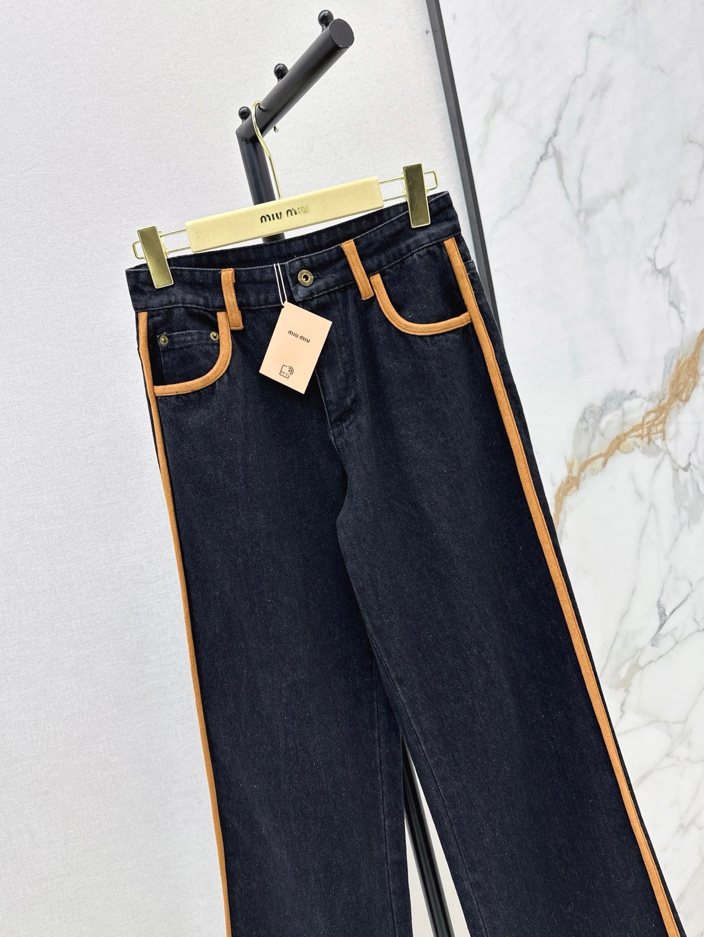M*u 25ss denim and leather jeans