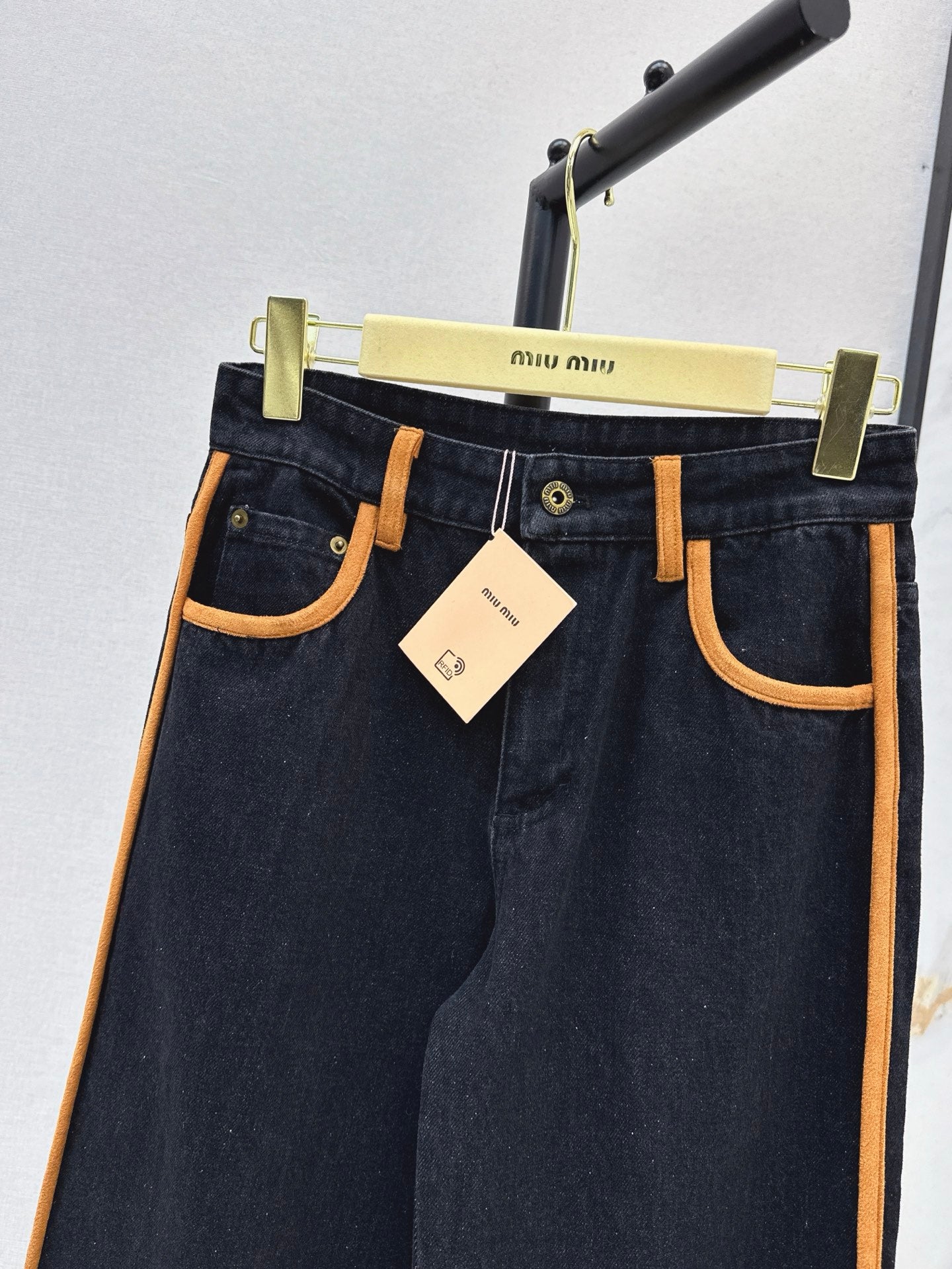 M*u 25ss denim and leather jeans