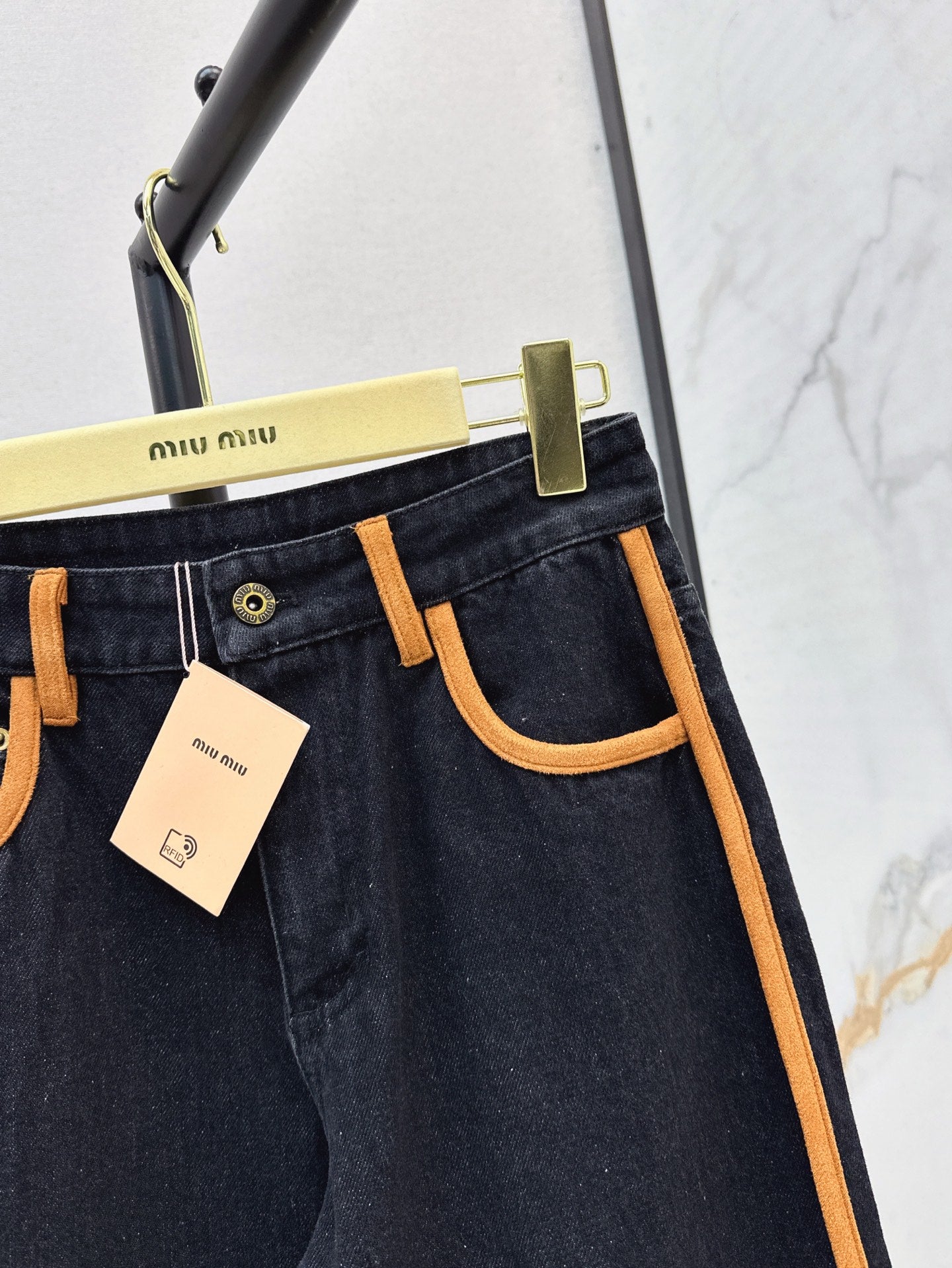 M*u 25ss denim and leather jeans