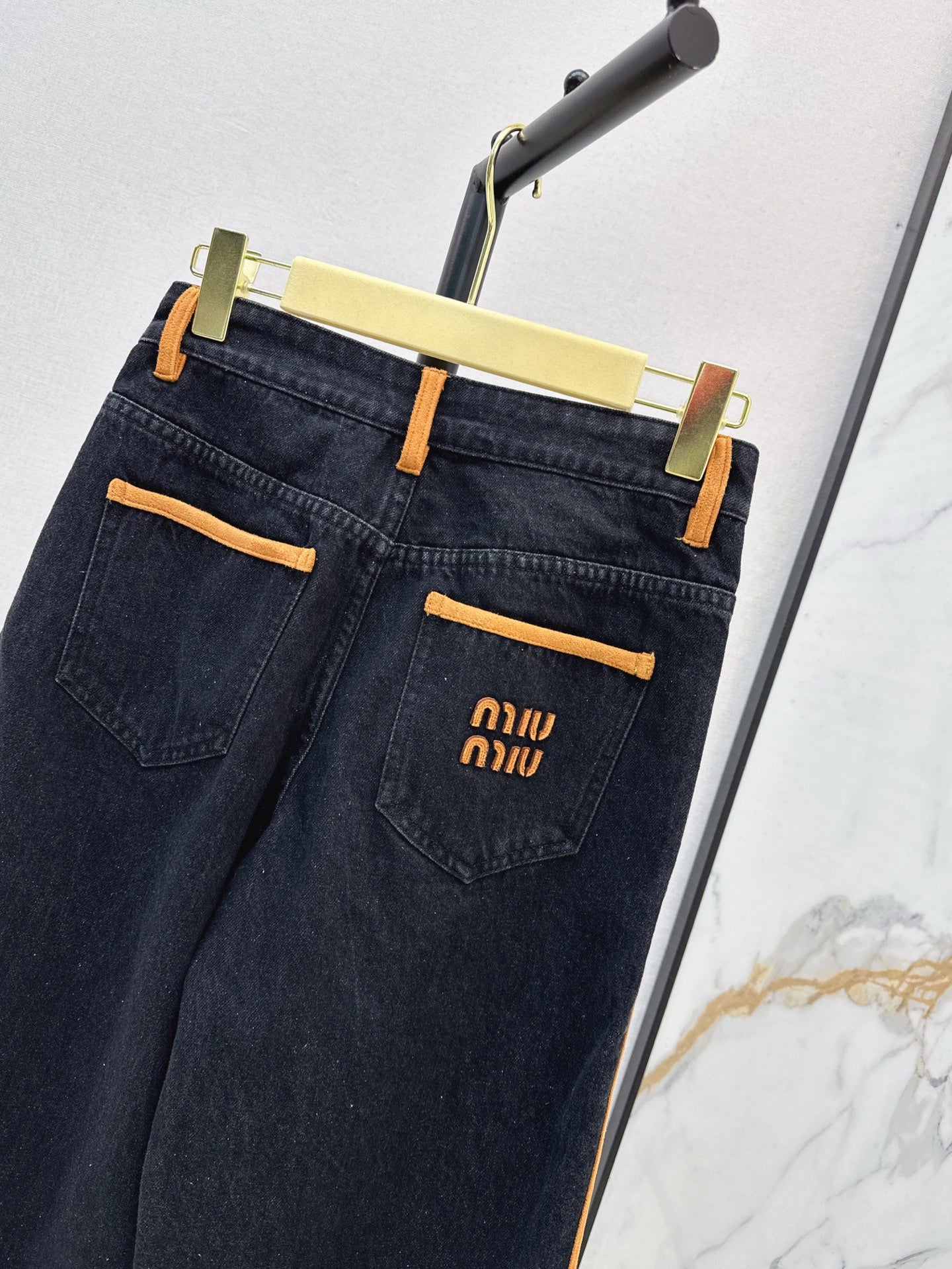 M*u 25ss denim and leather jeans