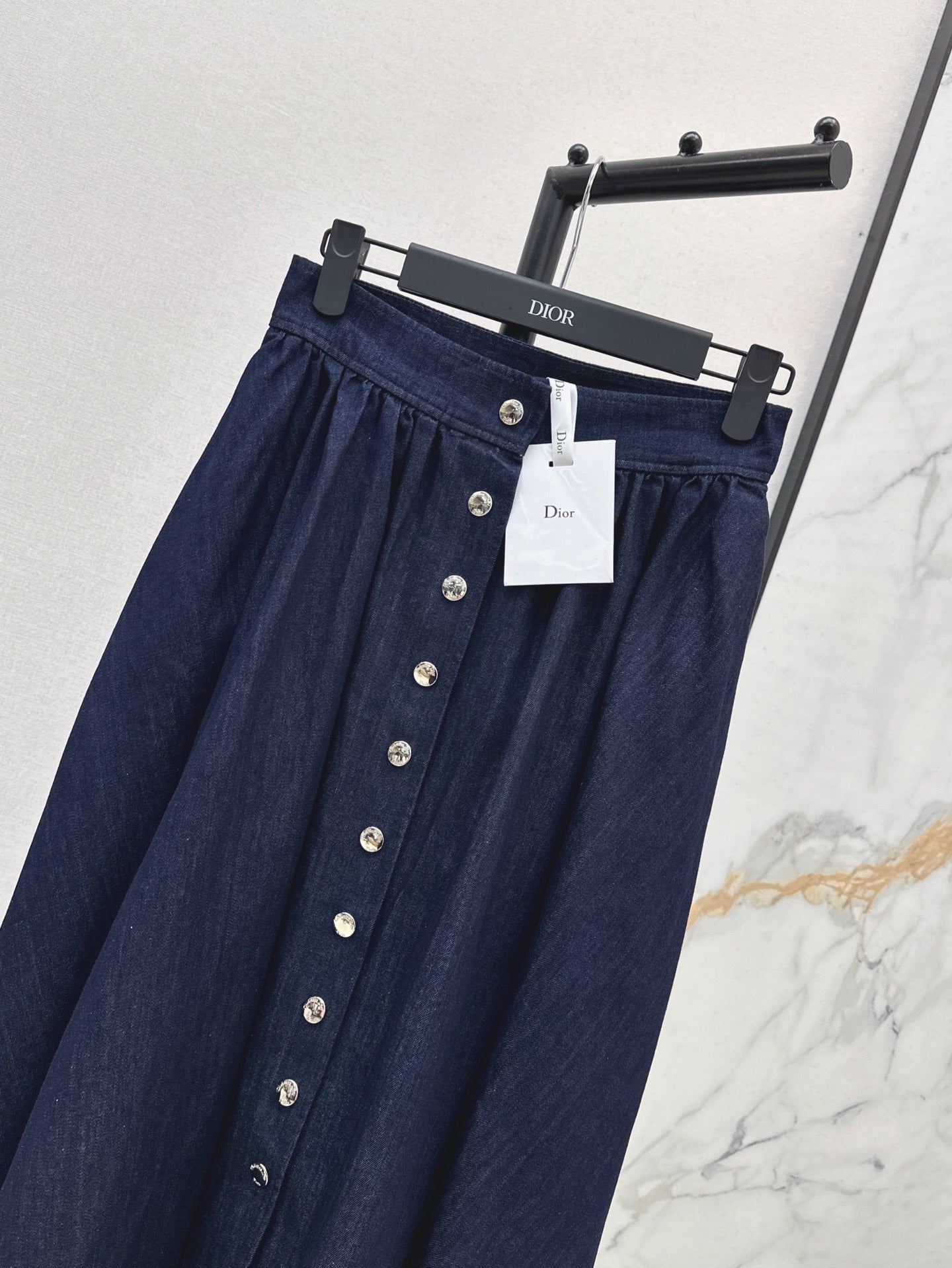 D*r 25ss button flared denim skirt