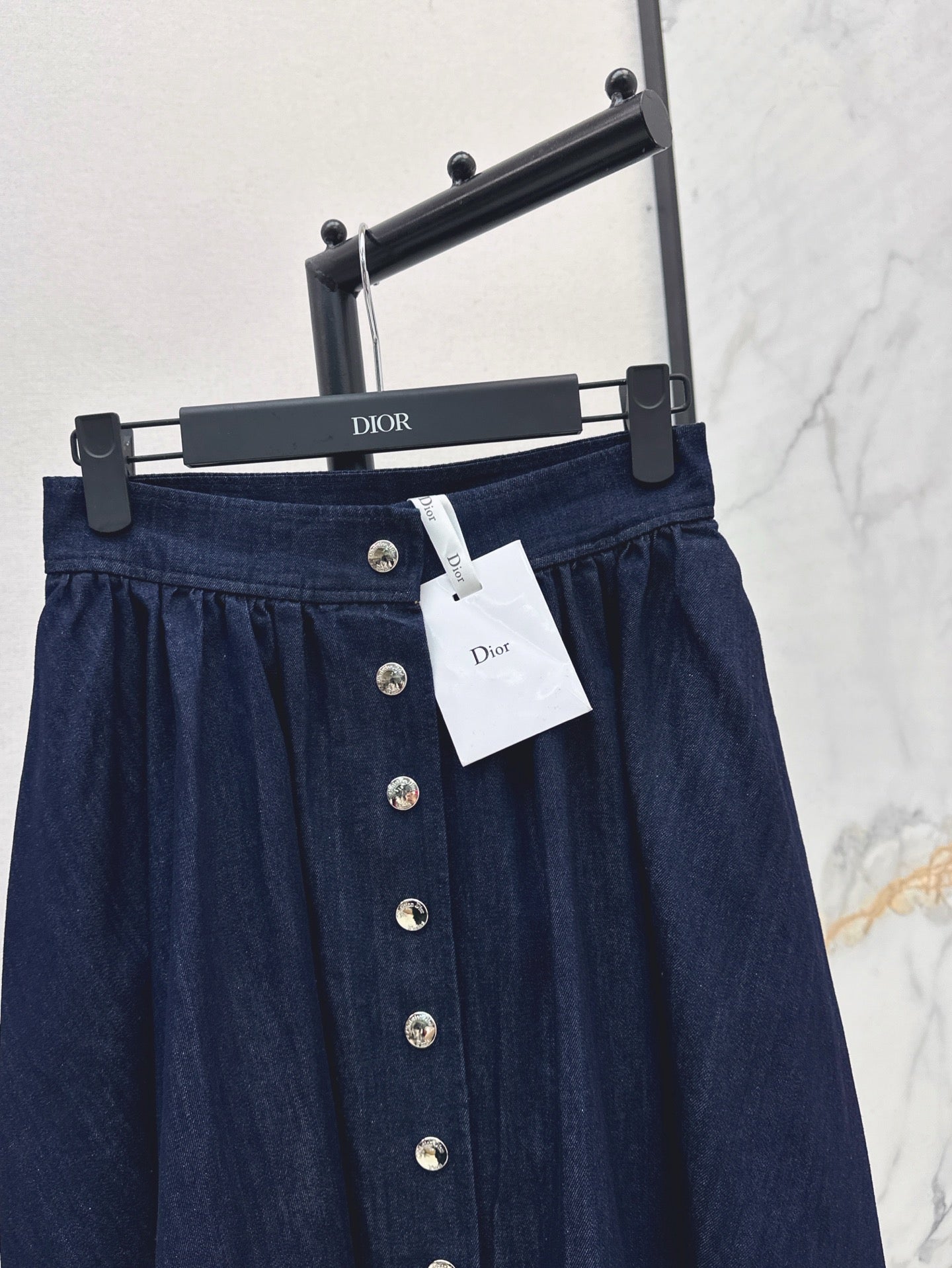D*r 25ss button flared denim skirt