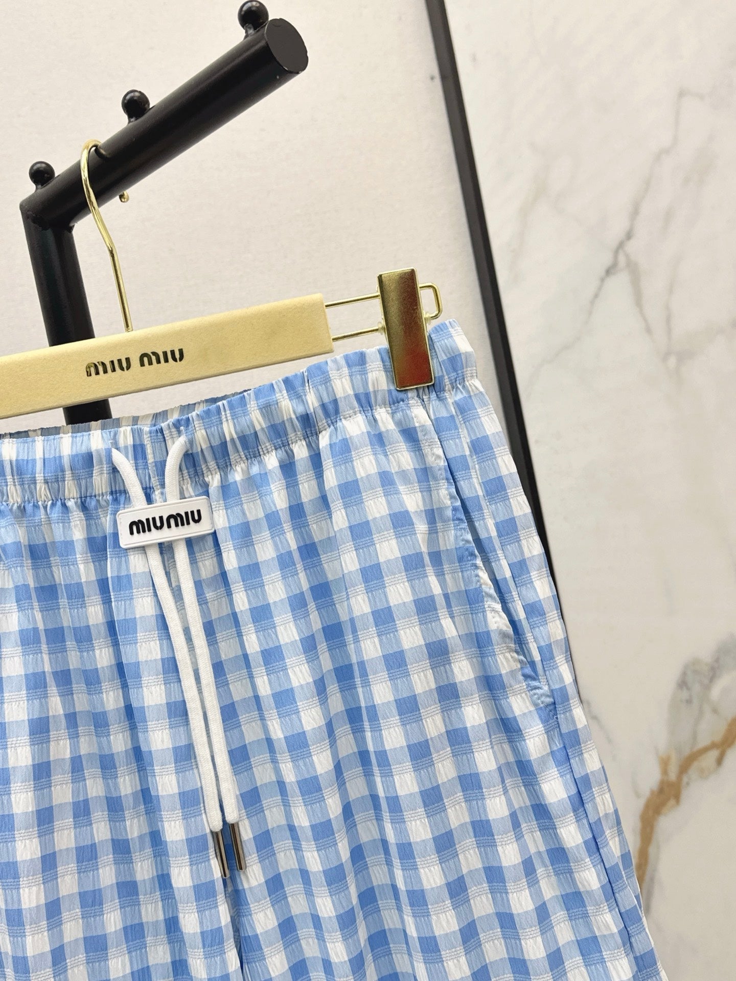 M*u 25ss check drawstring pants