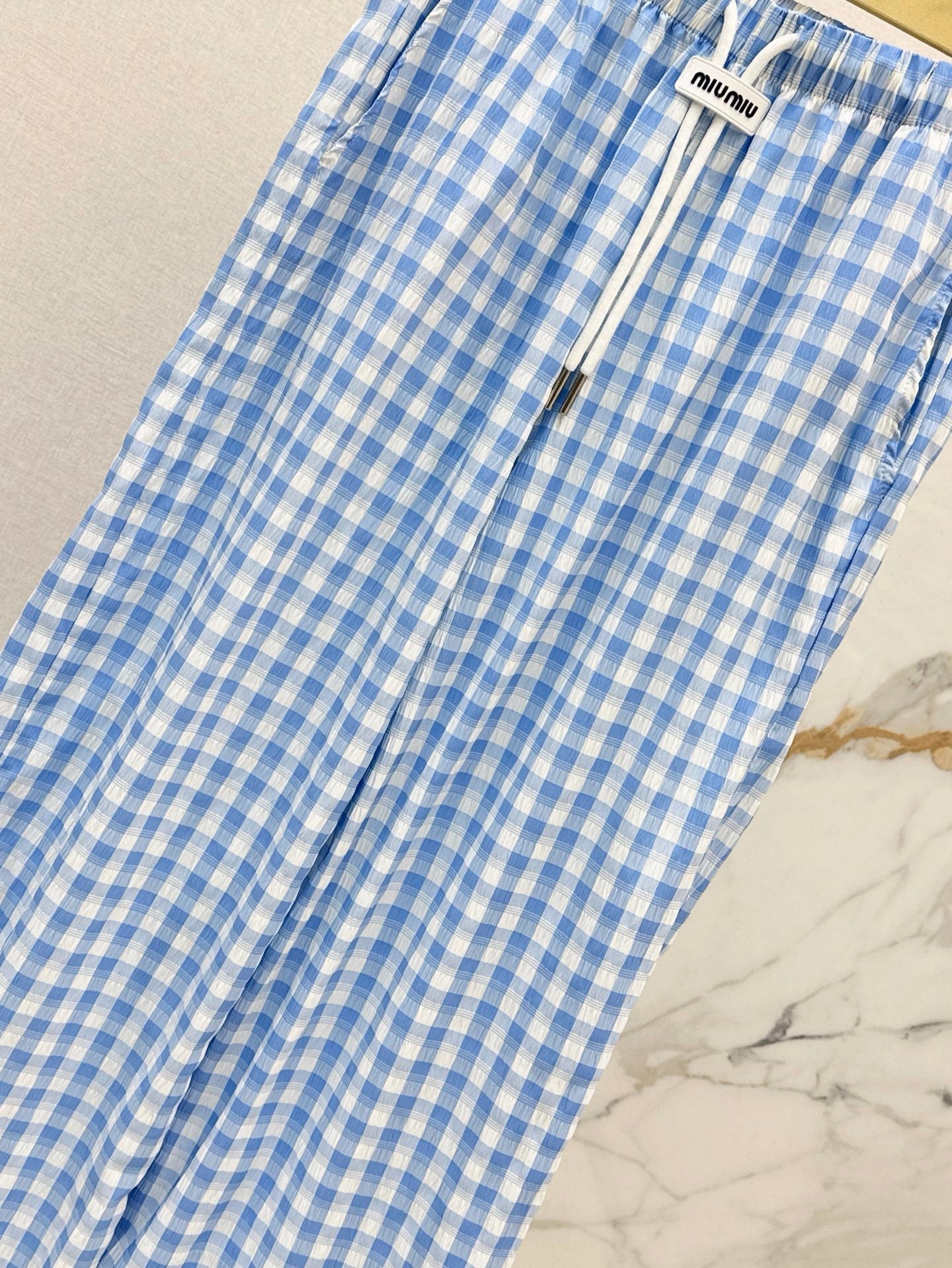 M*u 25ss check drawstring pants