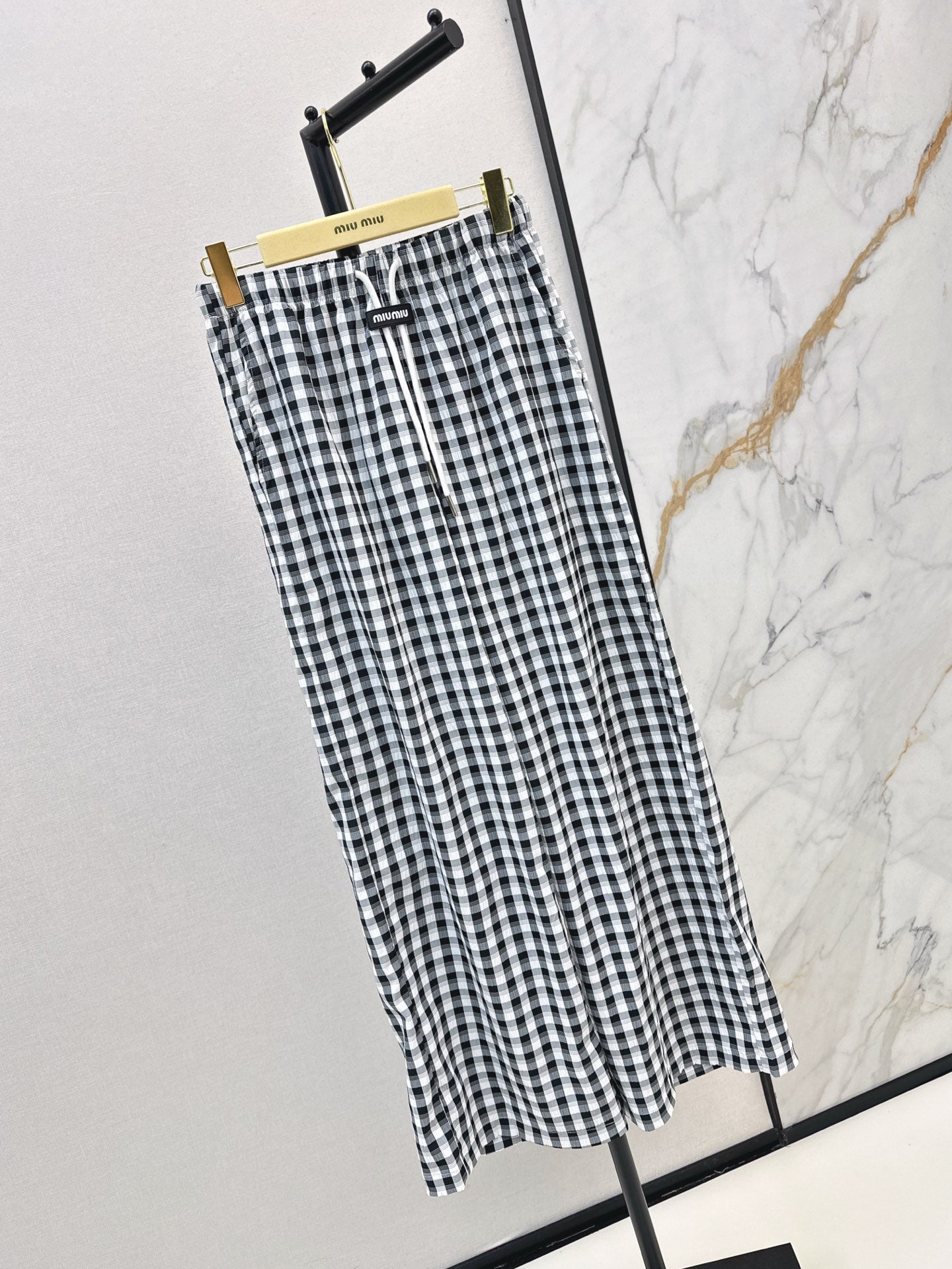 M*u 25ss check drawstring pants