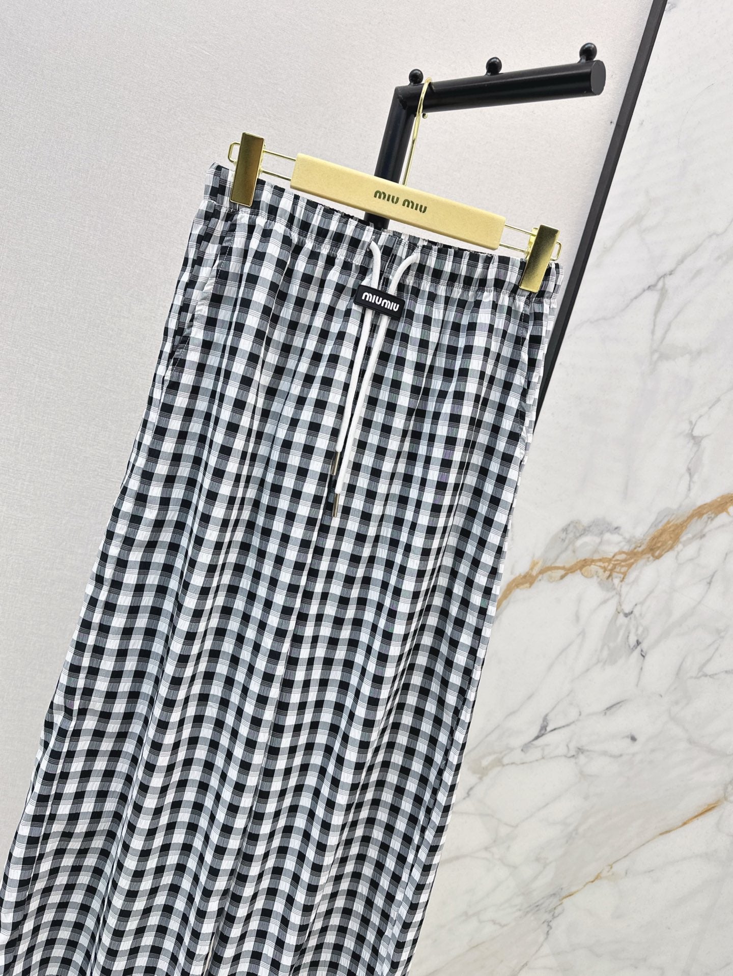 M*u 25ss check drawstring pants