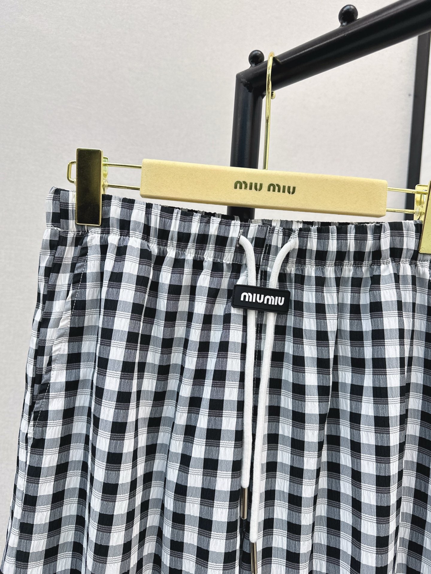 M*u 25ss check drawstring pants