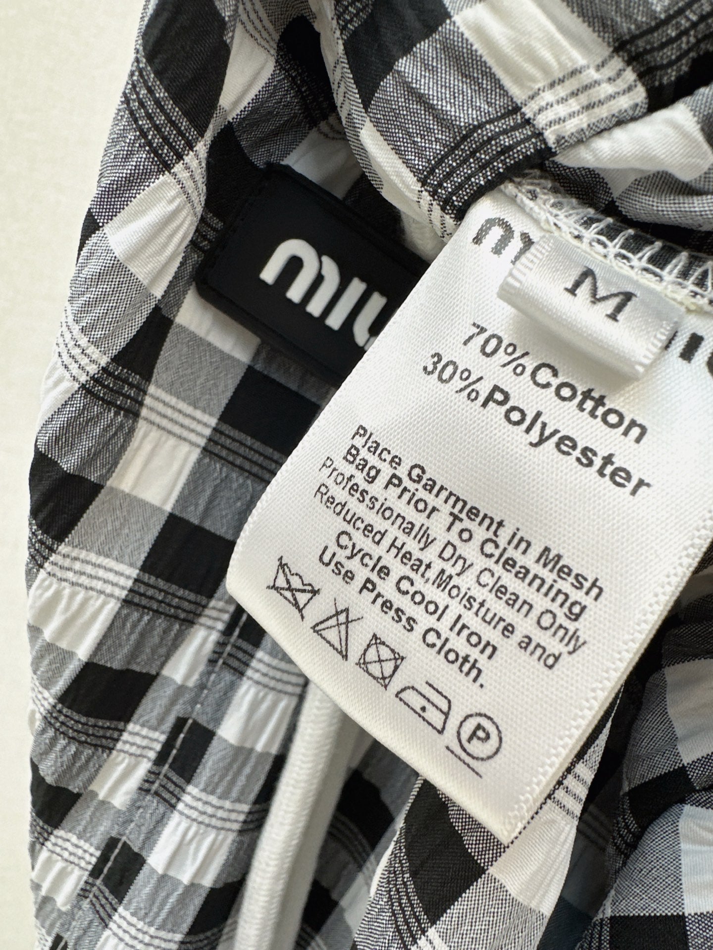 M*u 25ss check drawstring pants