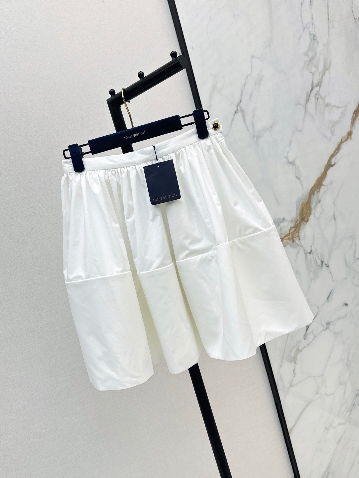 Loui* 25ss XL hem mini skirt