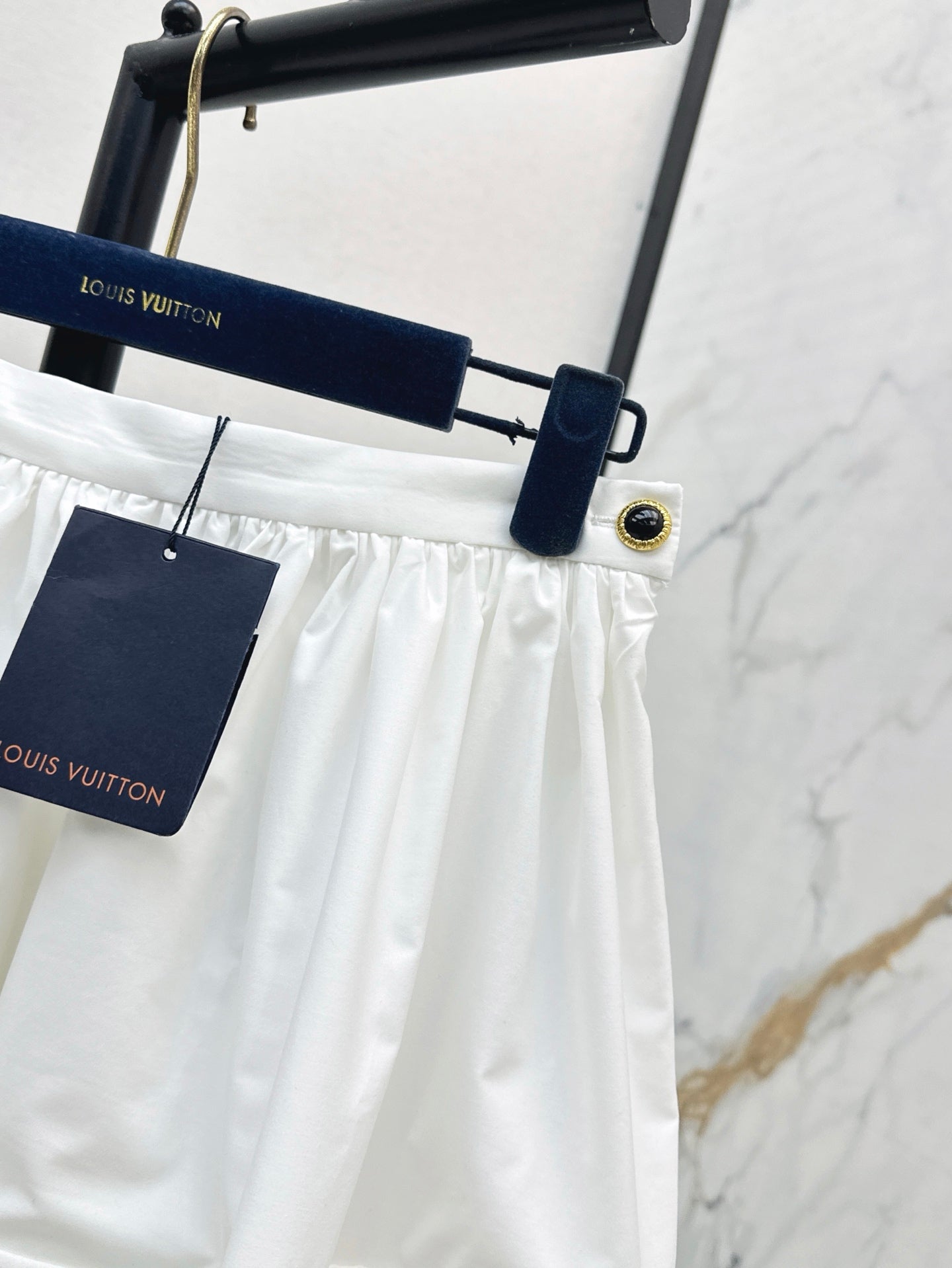 Loui* 25ss XL hem mini skirt