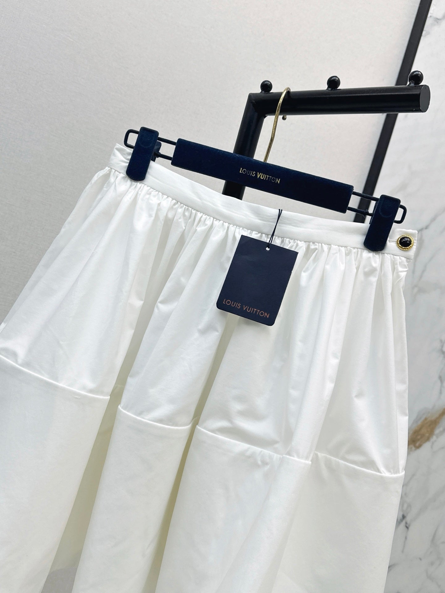 Loui* 25ss XL hem mini skirt