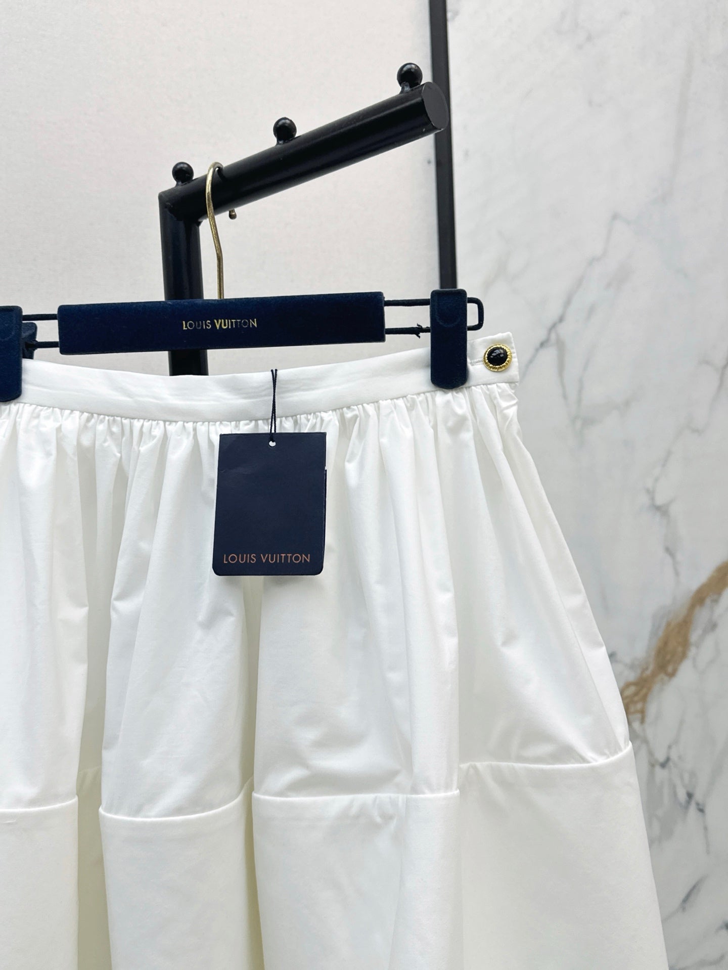 Loui* 25ss XL hem mini skirt