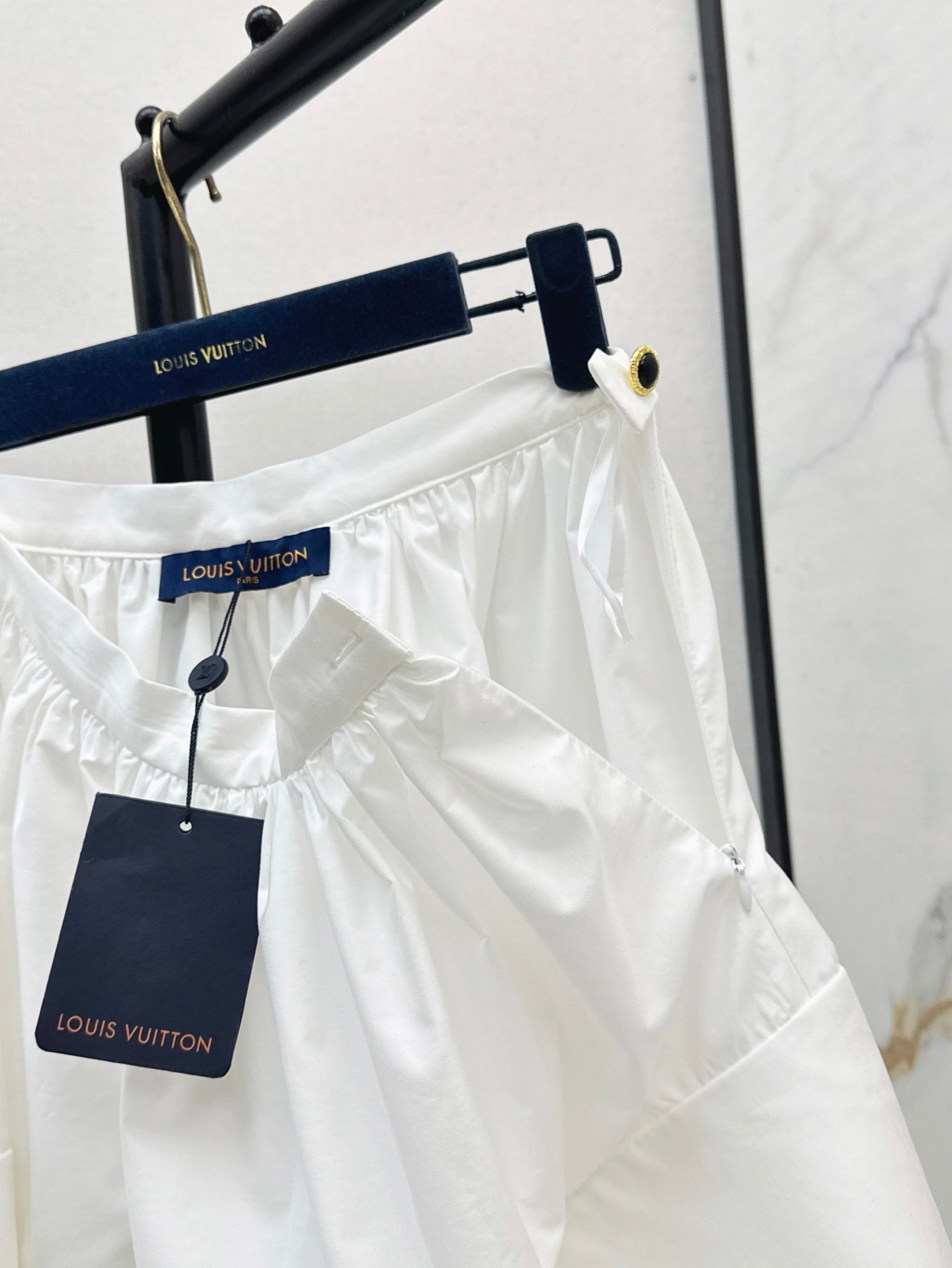 Loui* 25ss XL hem mini skirt