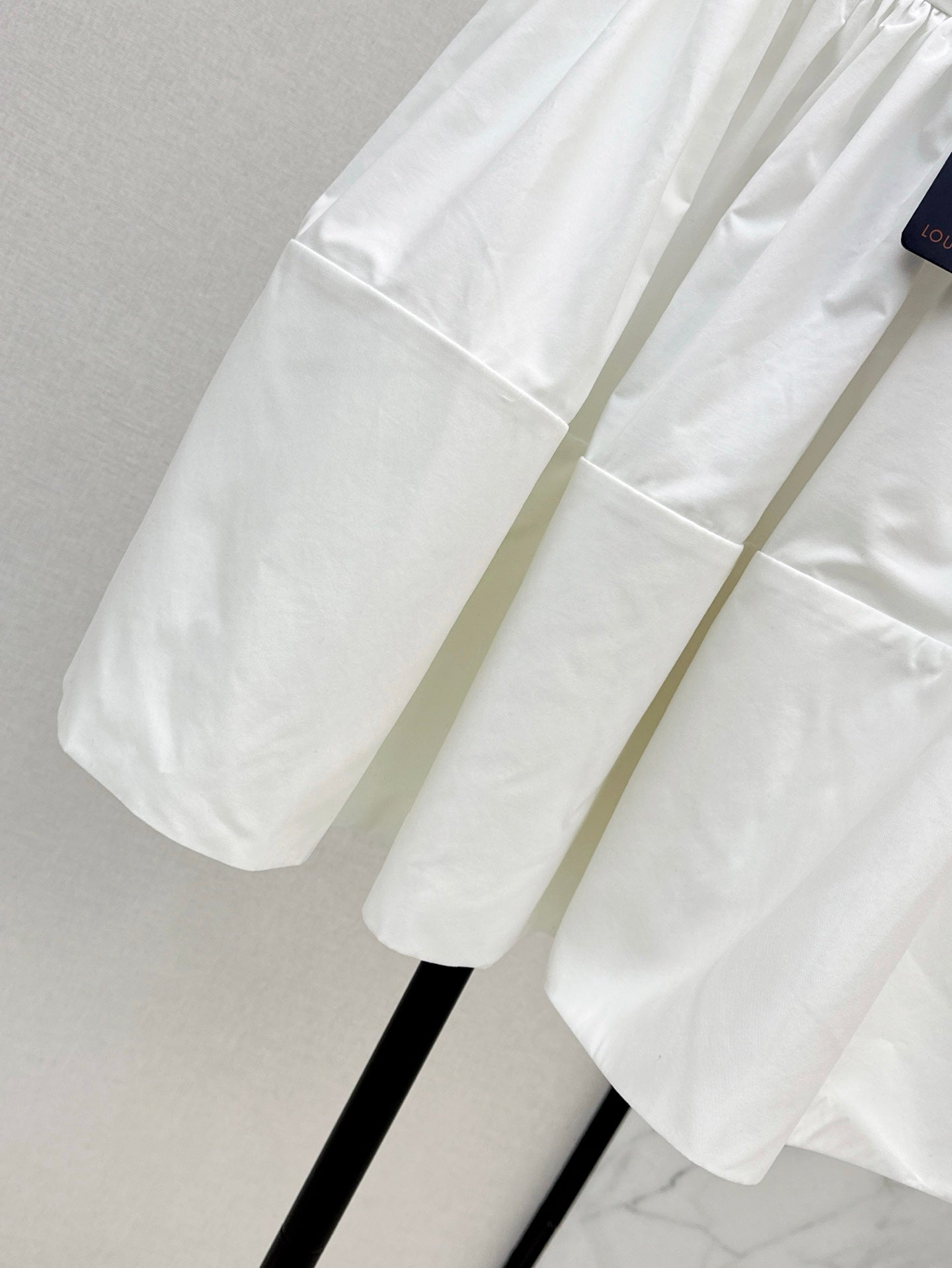 Loui* 25ss XL hem mini skirt