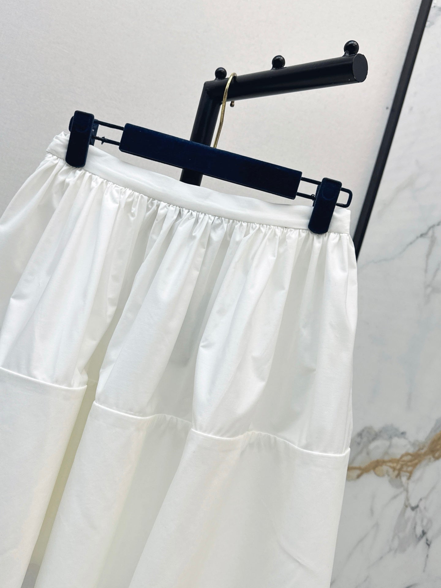 Loui* 25ss XL hem mini skirt