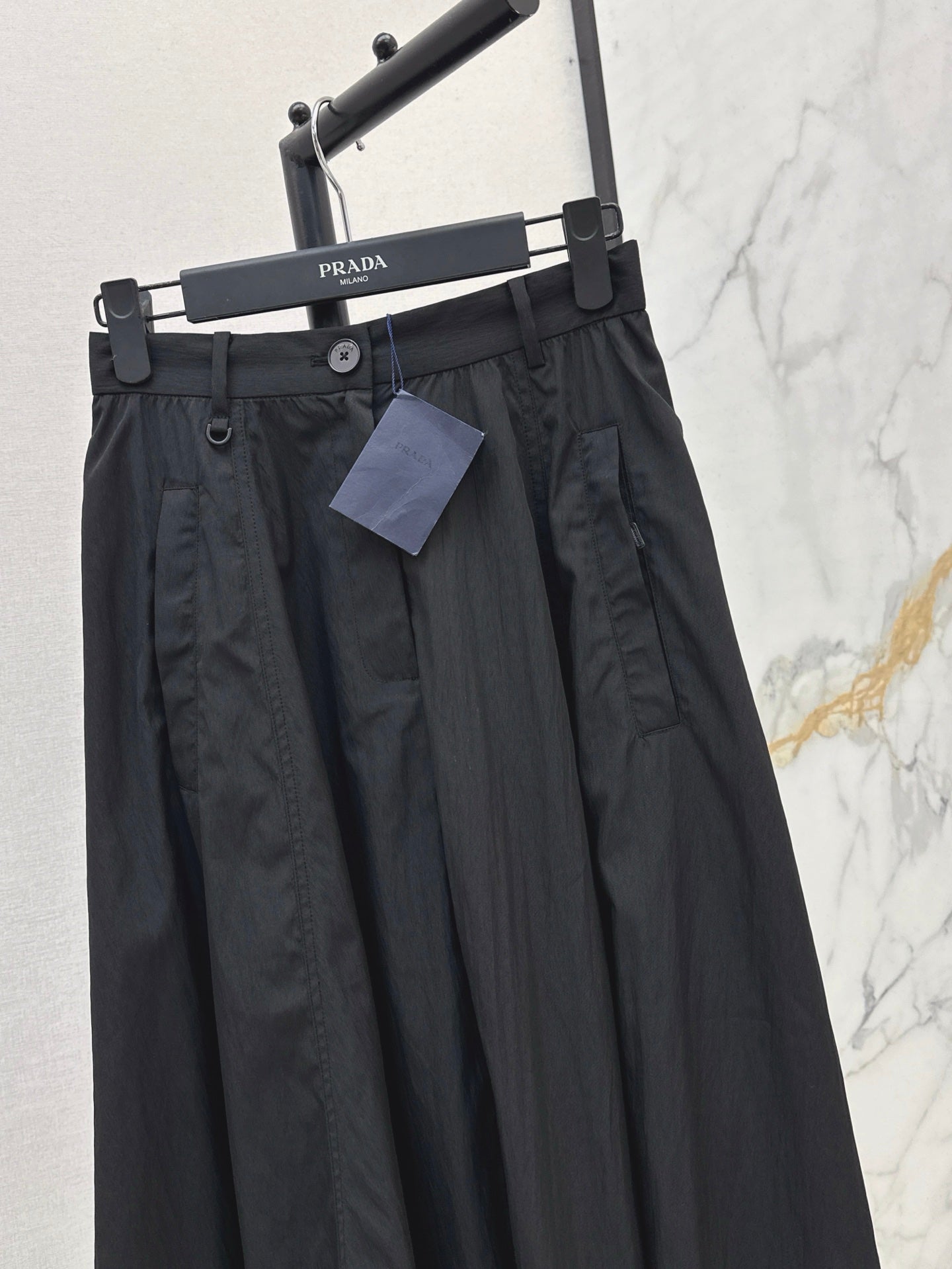 Pra* 25ss Long pleated flared skirt